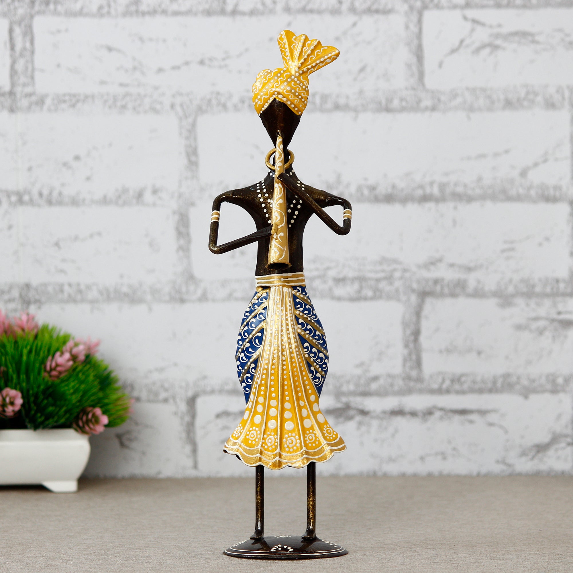 Iron Tribal Man Figurine Playing Trumpet Musical Instrument Decorative Showpiece (Black, Yellow and Blue)