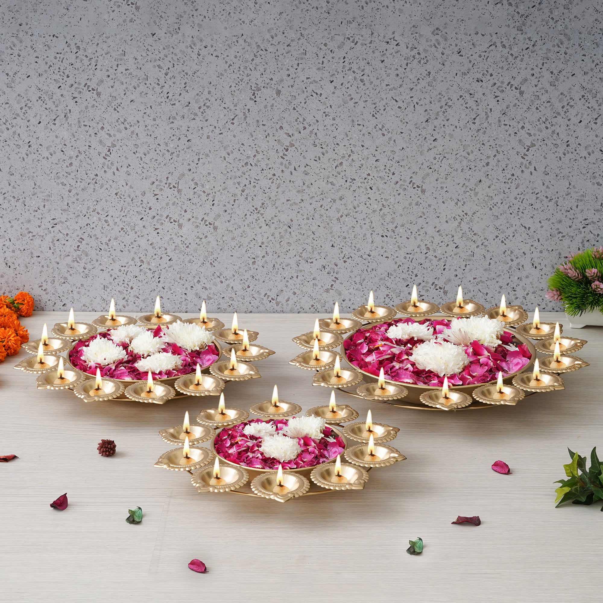 eCraftIndia Set of 3 Golden Metal Handcrafted Flower Shape Designer Urlis with Diyas 6