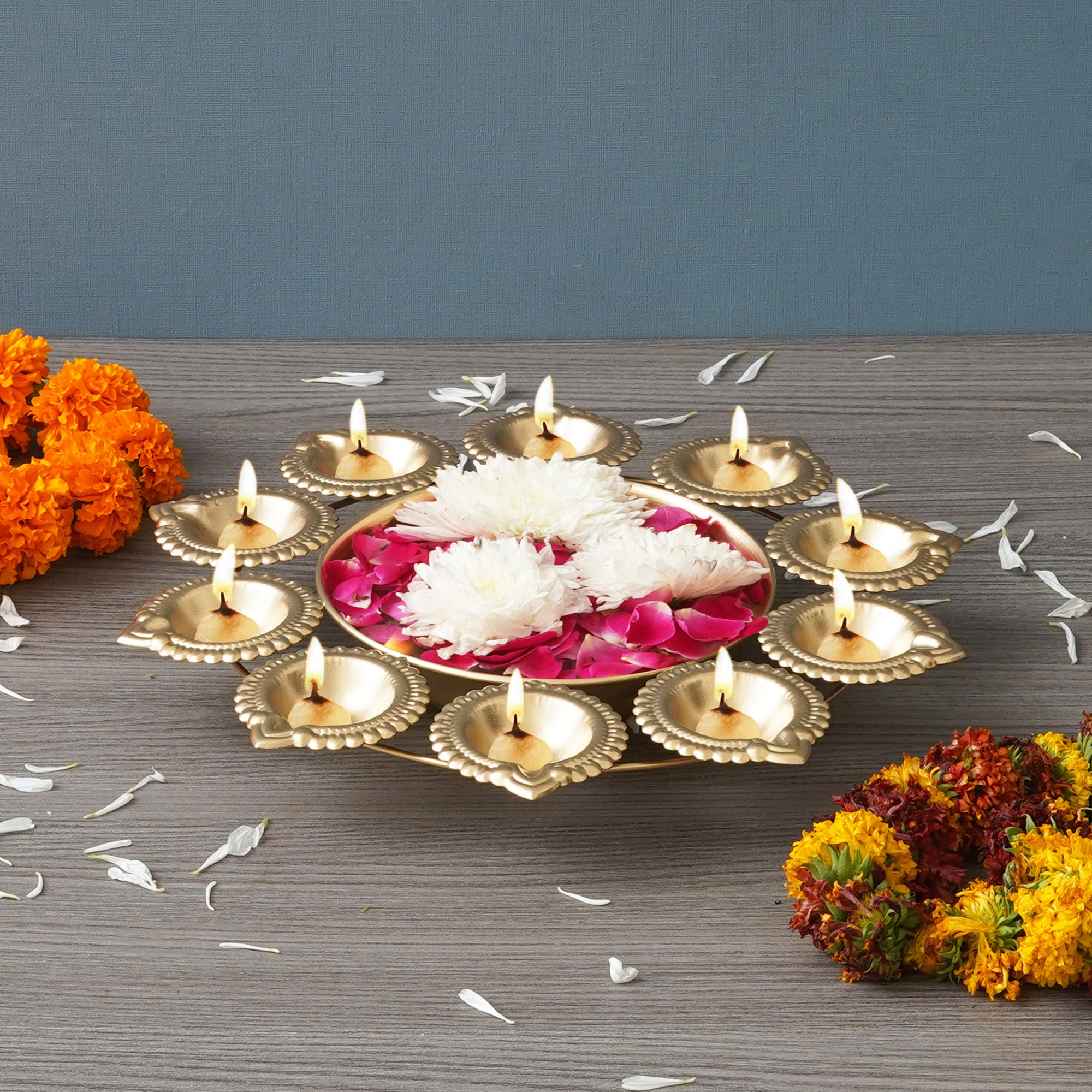 eCraftIndia Golden Metal Handcrafted Designer Urli with 10 Diyas 5