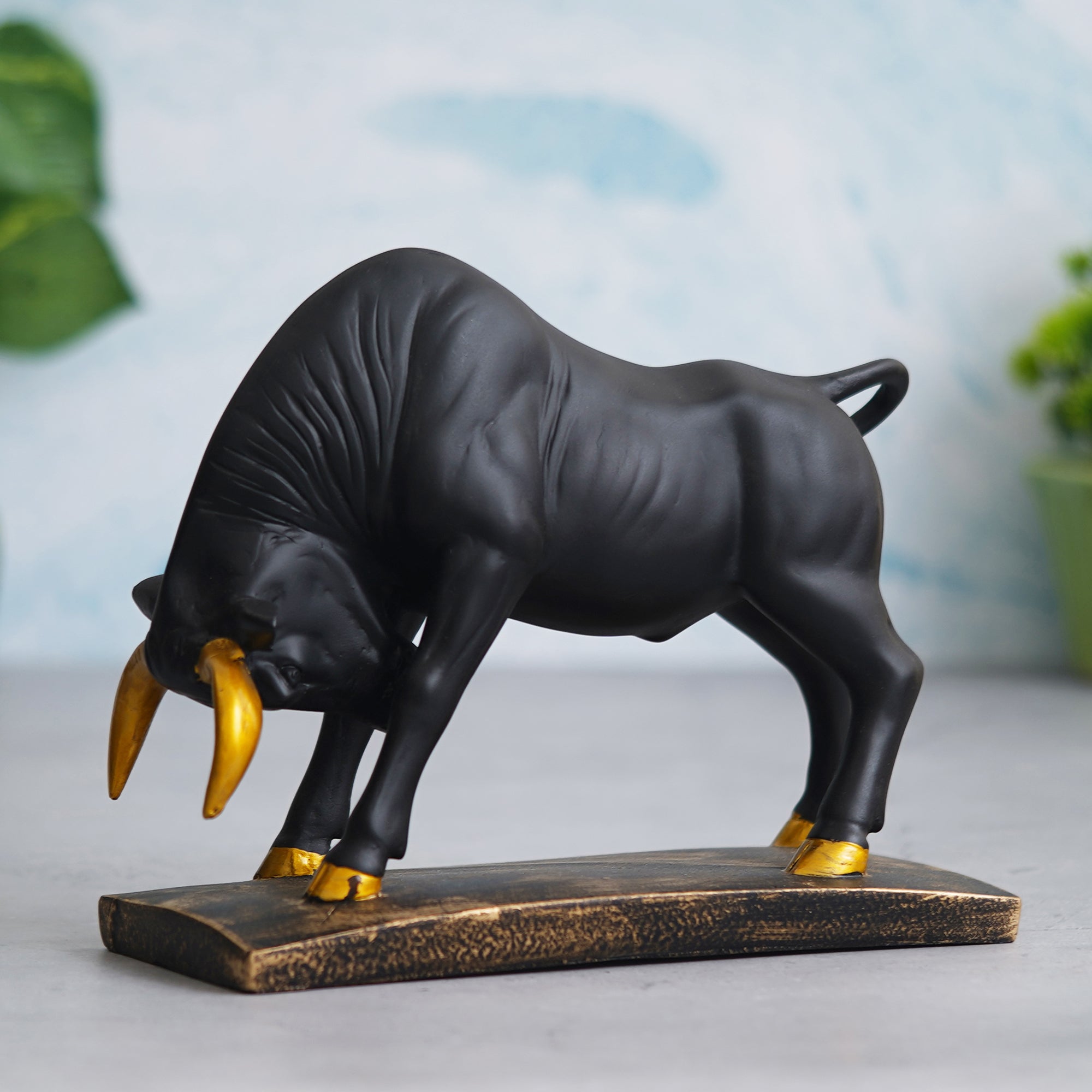 eCraftIndia Black and Golden Polyresin Charging Bull Statue Animal Figurine Decorative Showpiece 1