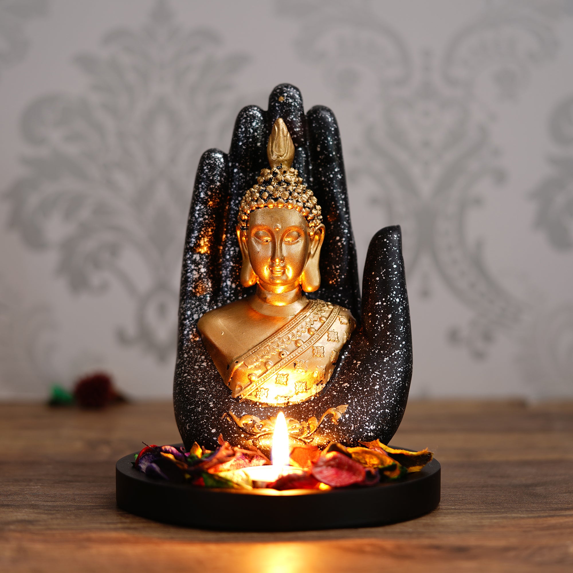 Polyresin Black and Golden Handcrafted Palm Buddha Statue with Wooden Base, Fragranced Petals and Tealight 1