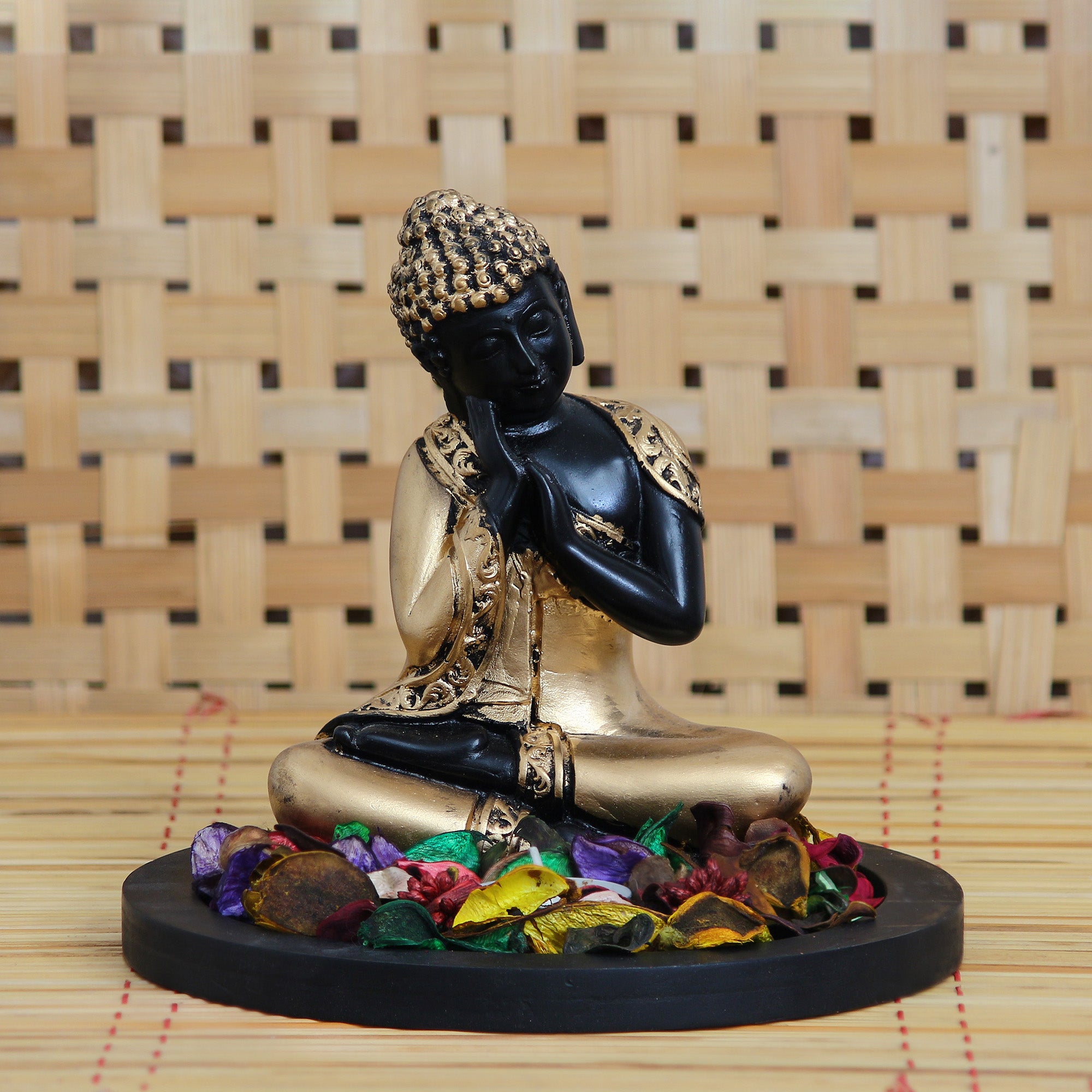 Polyresin Black and Golden Resting Buddha Statue with Wooden Base, Fragranced Petals and Tealight