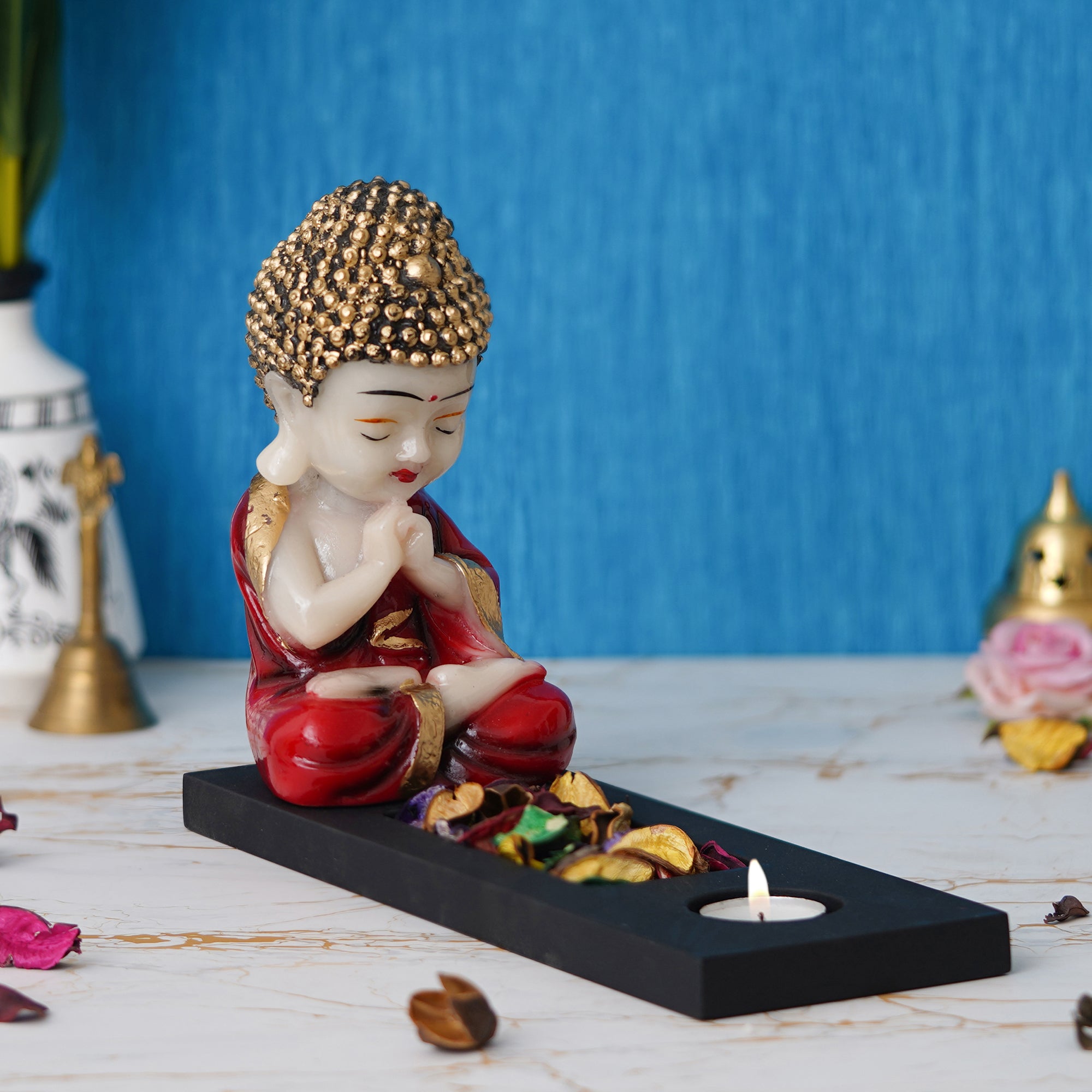 Red, Gold & Black Polyresin Praying Monk Showpiece with Rectangle Wooden Base, Fragranced Petals & Tealight 6