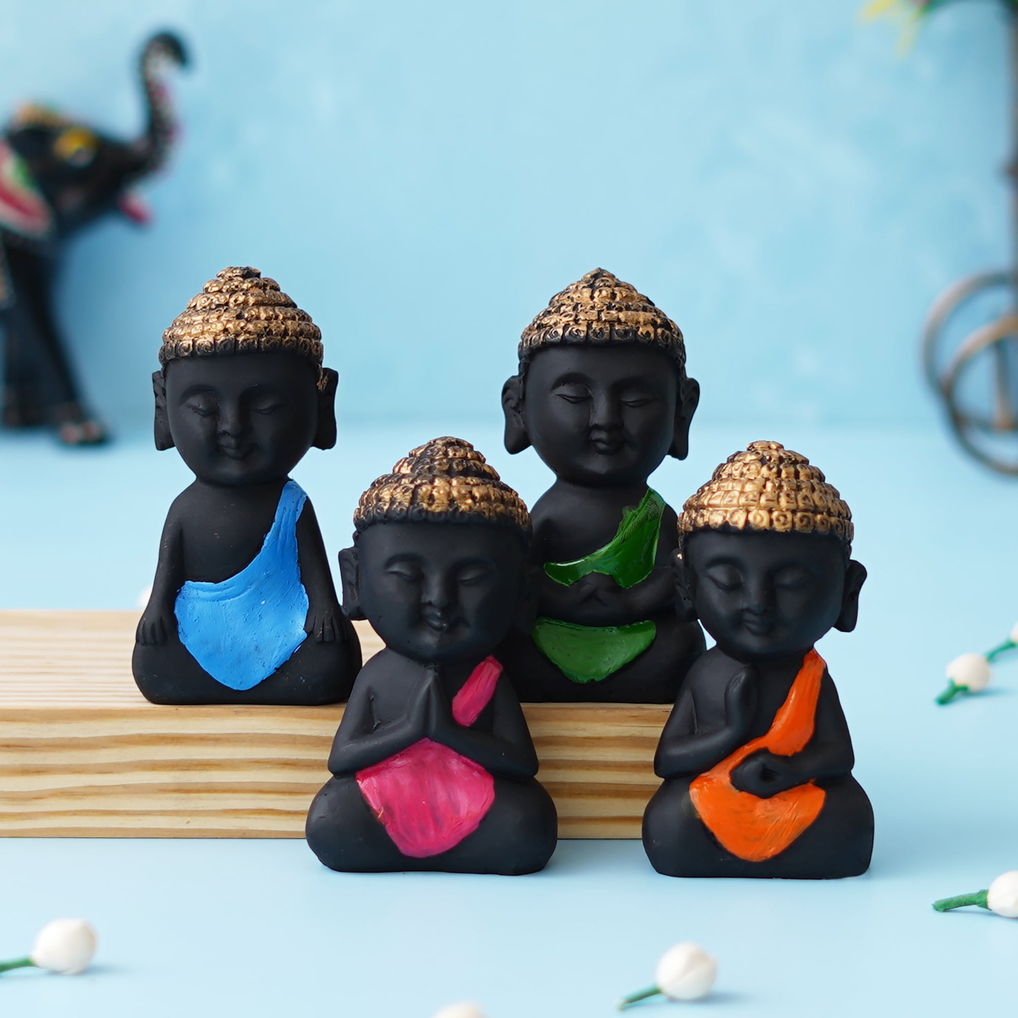 eCraftIndia Set Of 4 Pink, Blue, Green, Orange Polyresin Handcrafted Little Monk Buddha Statues 4