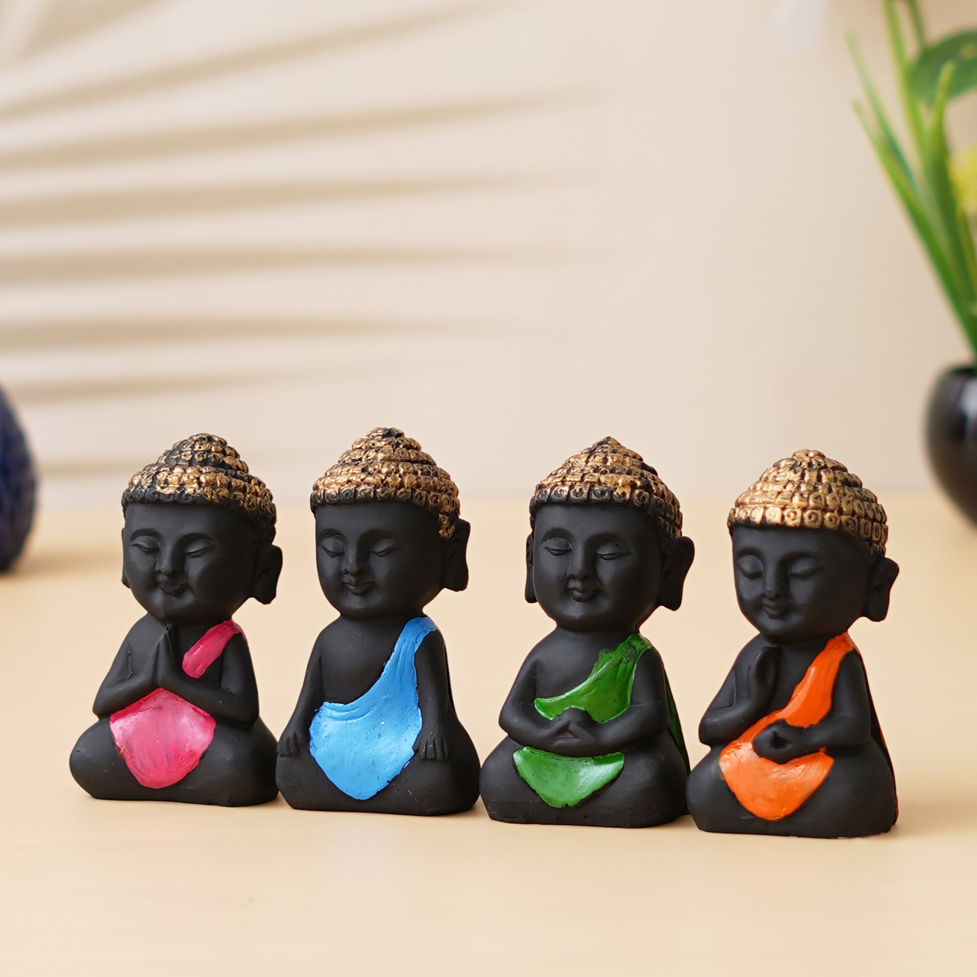 eCraftIndia Set Of 4 Pink, Blue, Green, Orange Polyresin Handcrafted Little Monk Buddha Statues 5