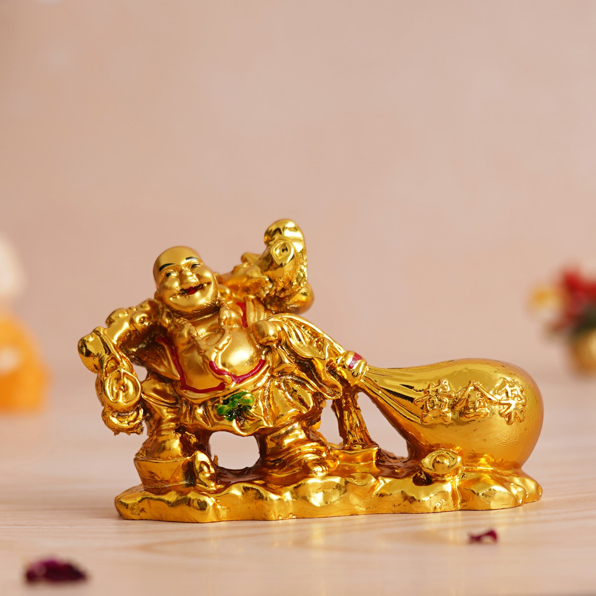 eCraftIndia Golden Polyresin Feng Shui Laughing Buddha Idol with Money Bag For Wealth And Good Luck