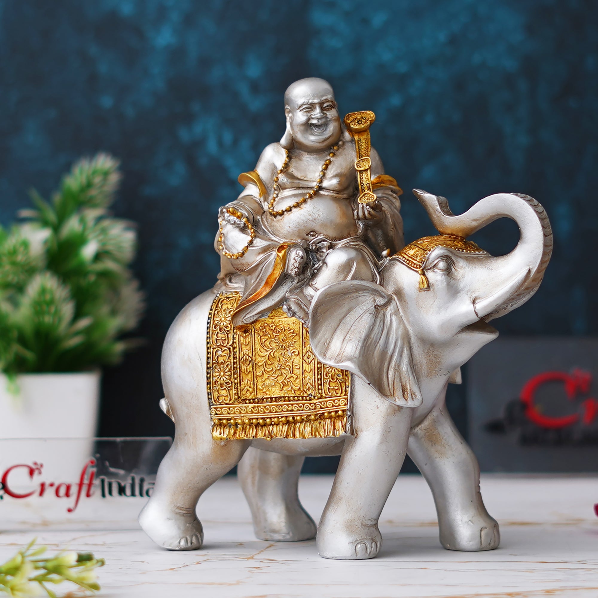 eCraftIndia Silver & Golden Laughing Buddha Statue Seating on Elephant Figurine