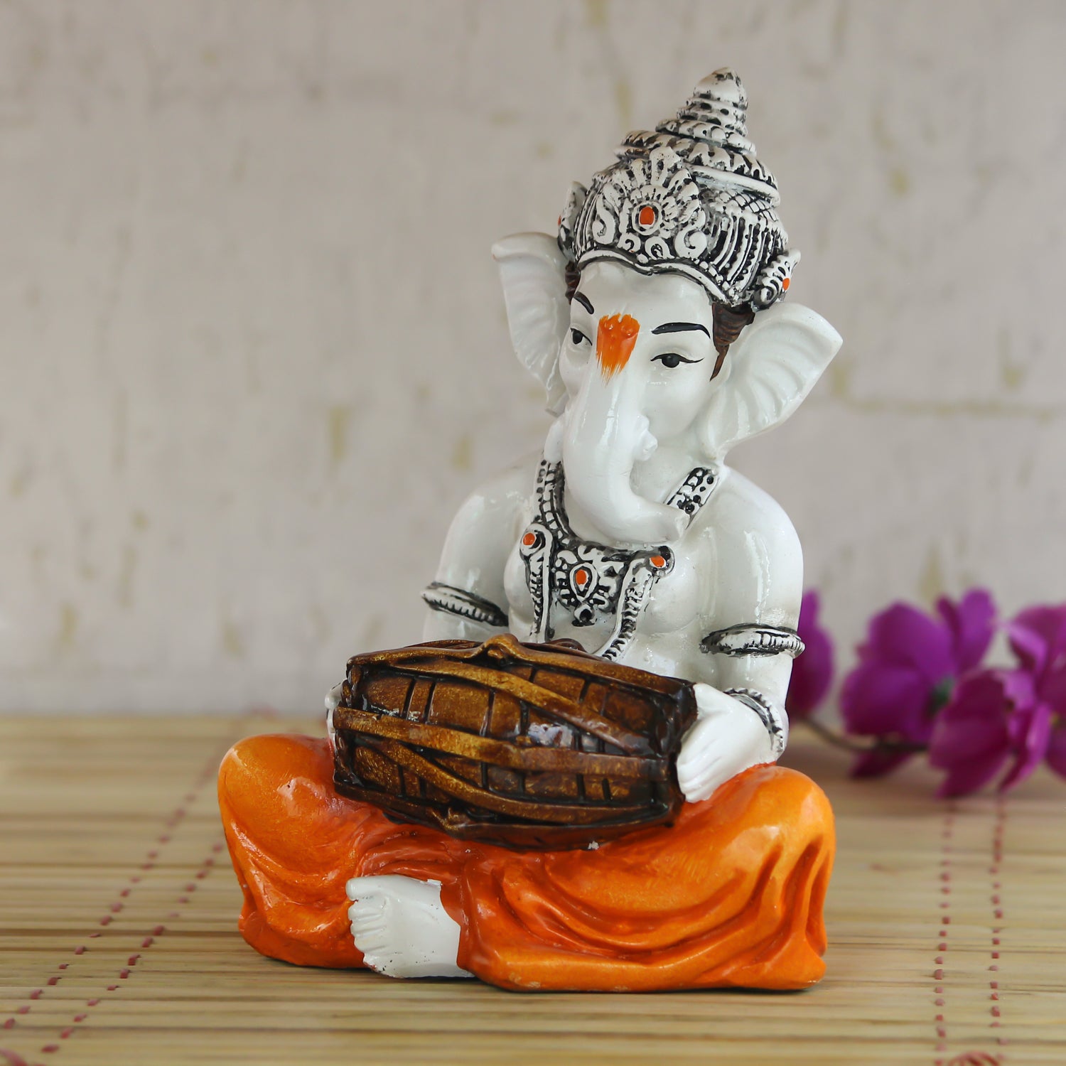 Lord Ganesha Idol Playing Dholak Musical Instrument