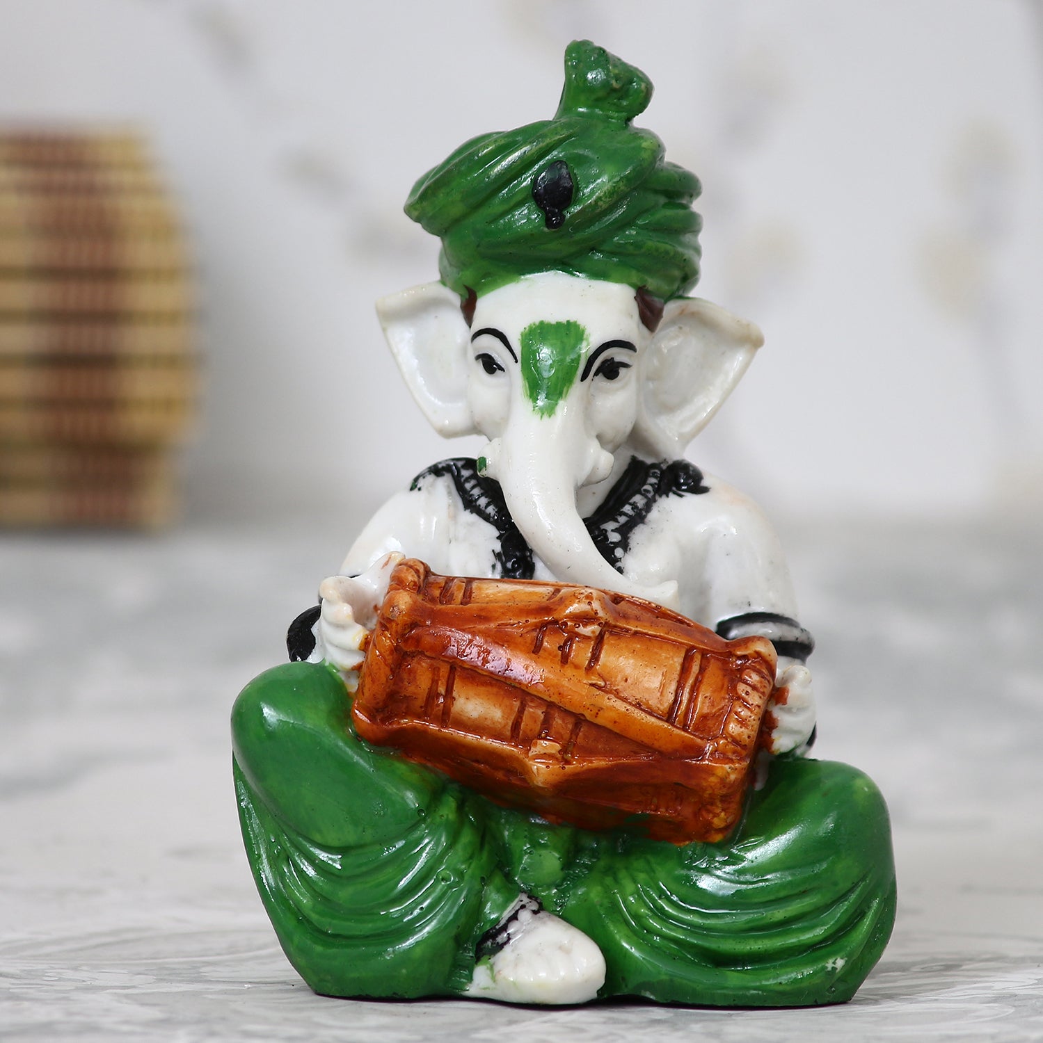 Lord Ganesha Idol Playing Dholak Musical Instrument