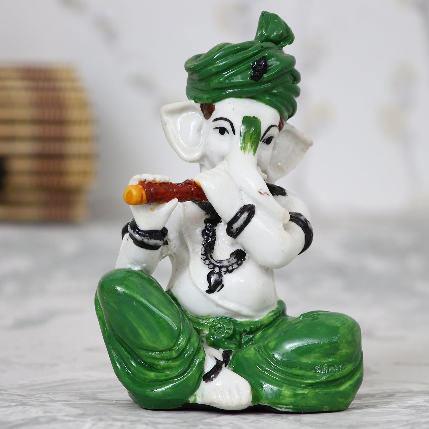 Lord Ganesha playing Flute