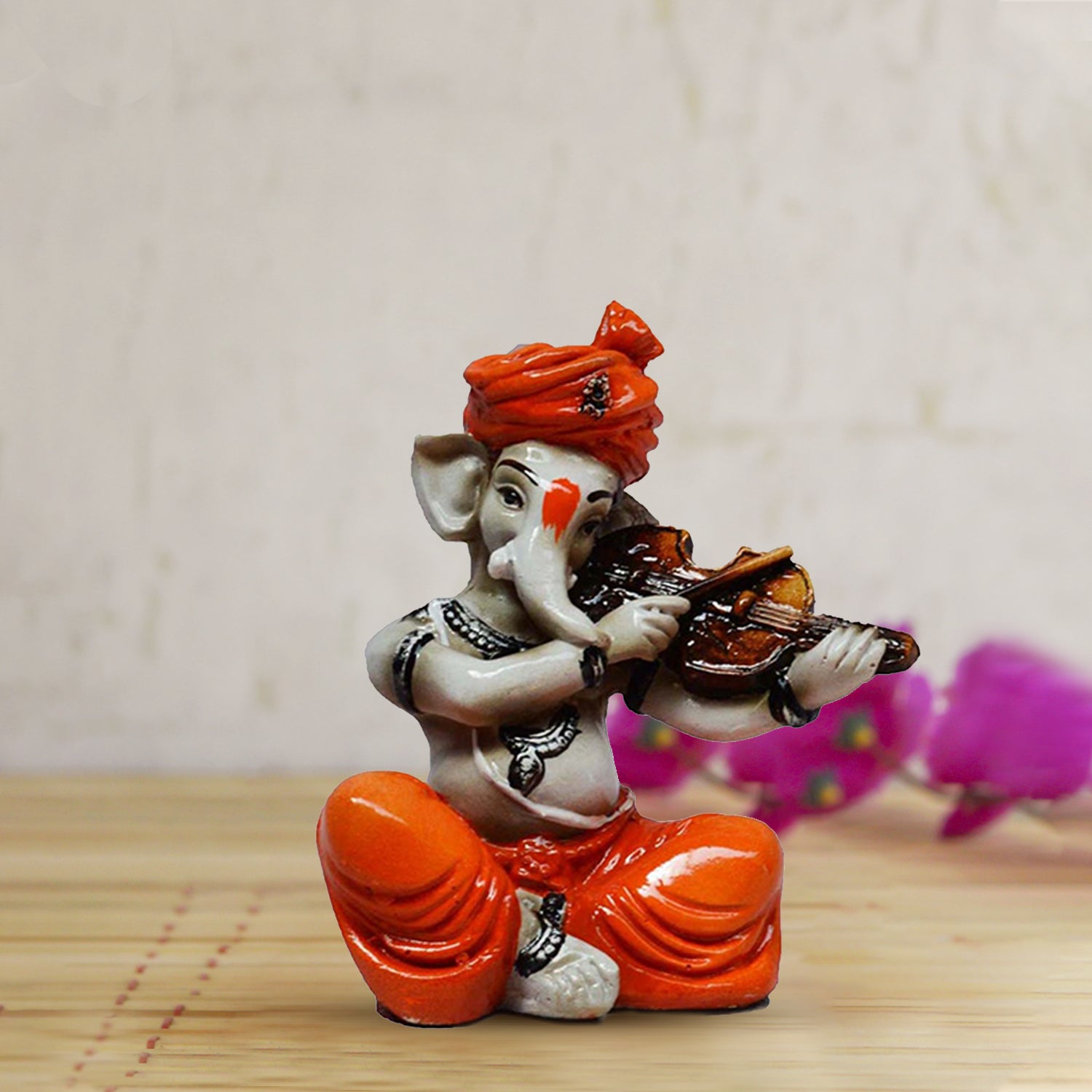 Orange Polyresin Lord Ganesha playing Violin Idol
