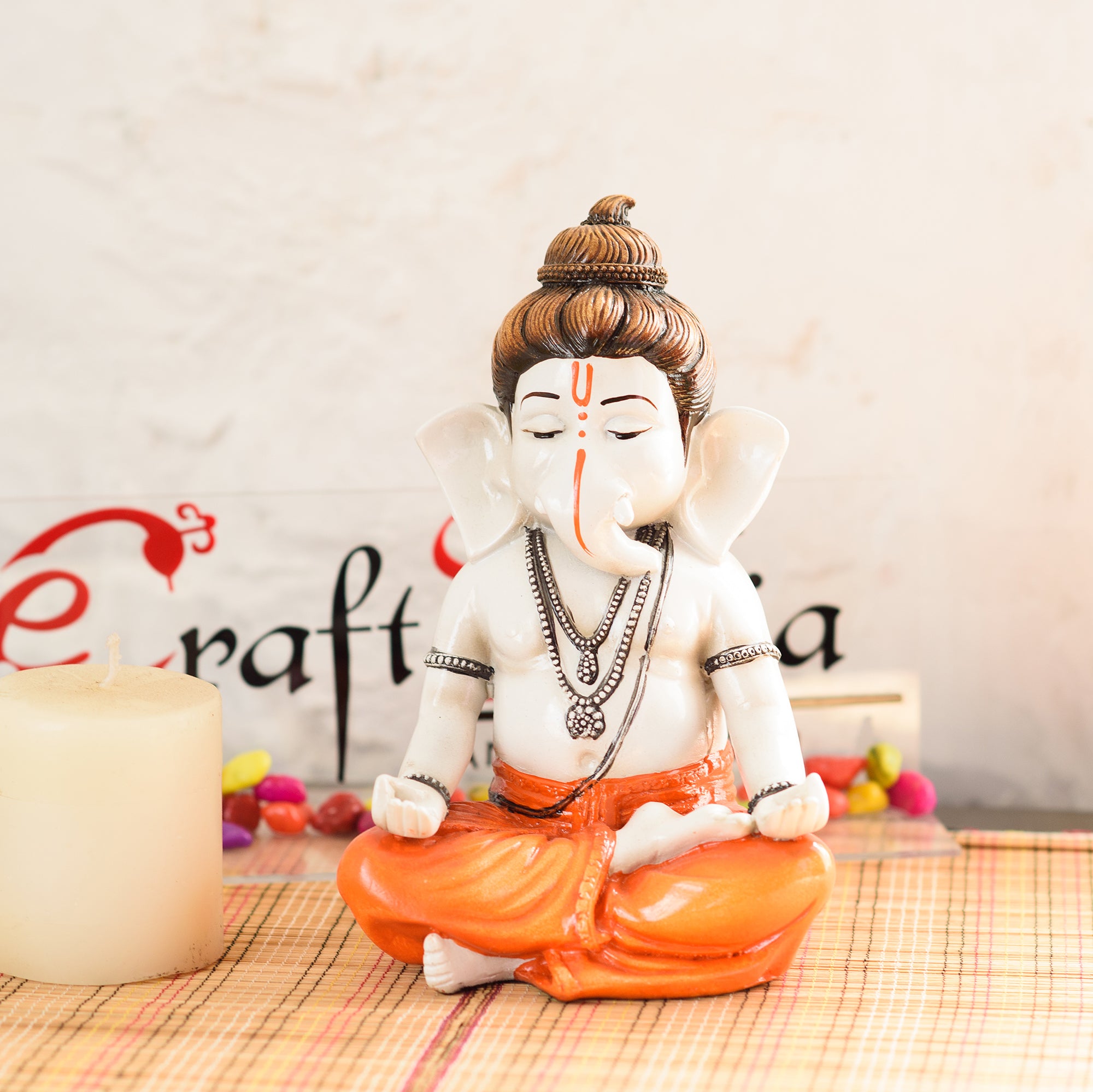 Orange Polyresin Meditating Lord Ganesha Statue