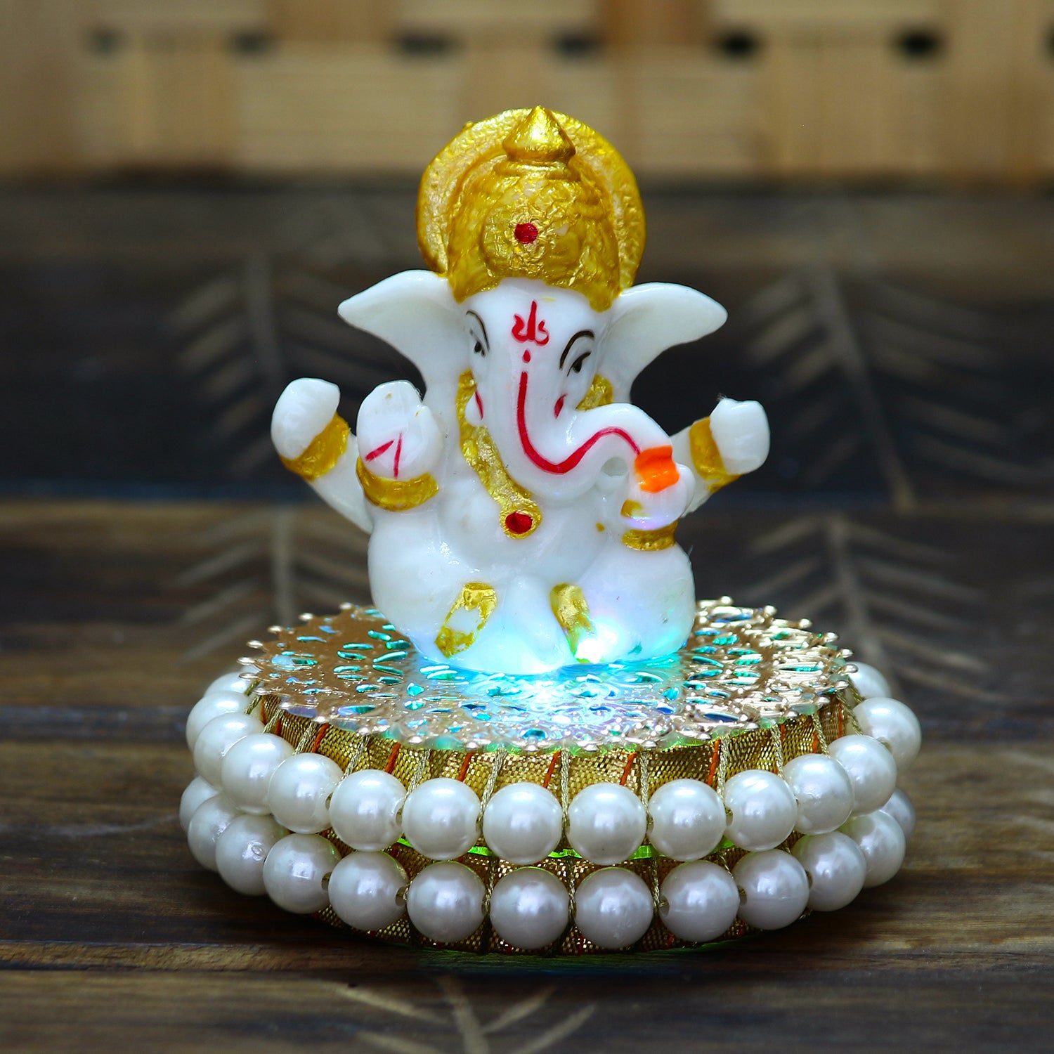 Desginer Stone and Pearl Rakhi with Lord Ganesha Idol on Decorative Handcrafted Plate for Home and Car and Roli Chawal Pack 2