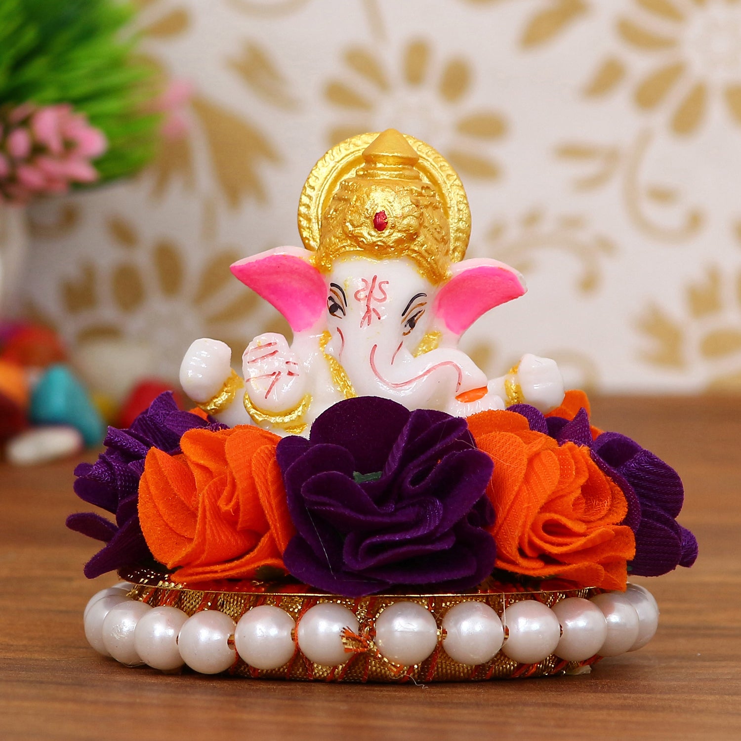 Lord Ganesha Idol On Decorative Handcrafted Orange And Purple Flowers Plate