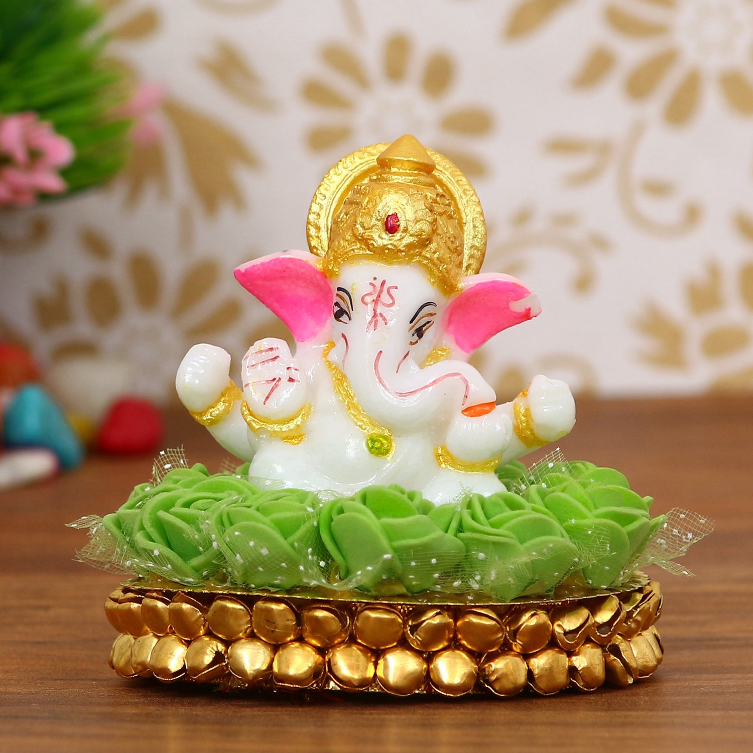 Lord Ganesha Idol on Decorative Handcrafted Plate with Green Flowers