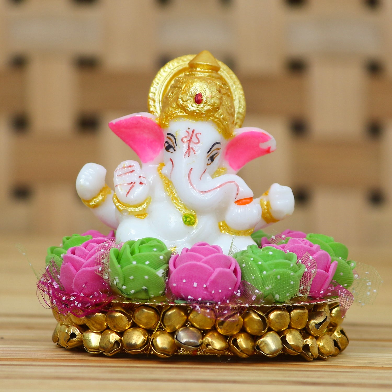 Golden and White Polyresin Lord Ganesha Idol on Decorative Pink and Green Flowers Plate 1