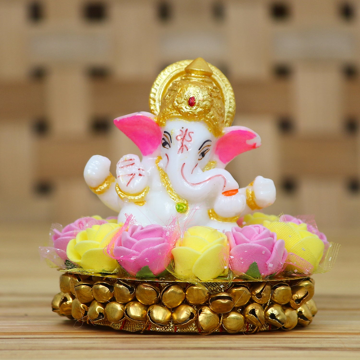 Golden and White Polyresin Lord Ganesha Idol on Decorative Handcrafted Plate with Pink and Yellow Flowers 1