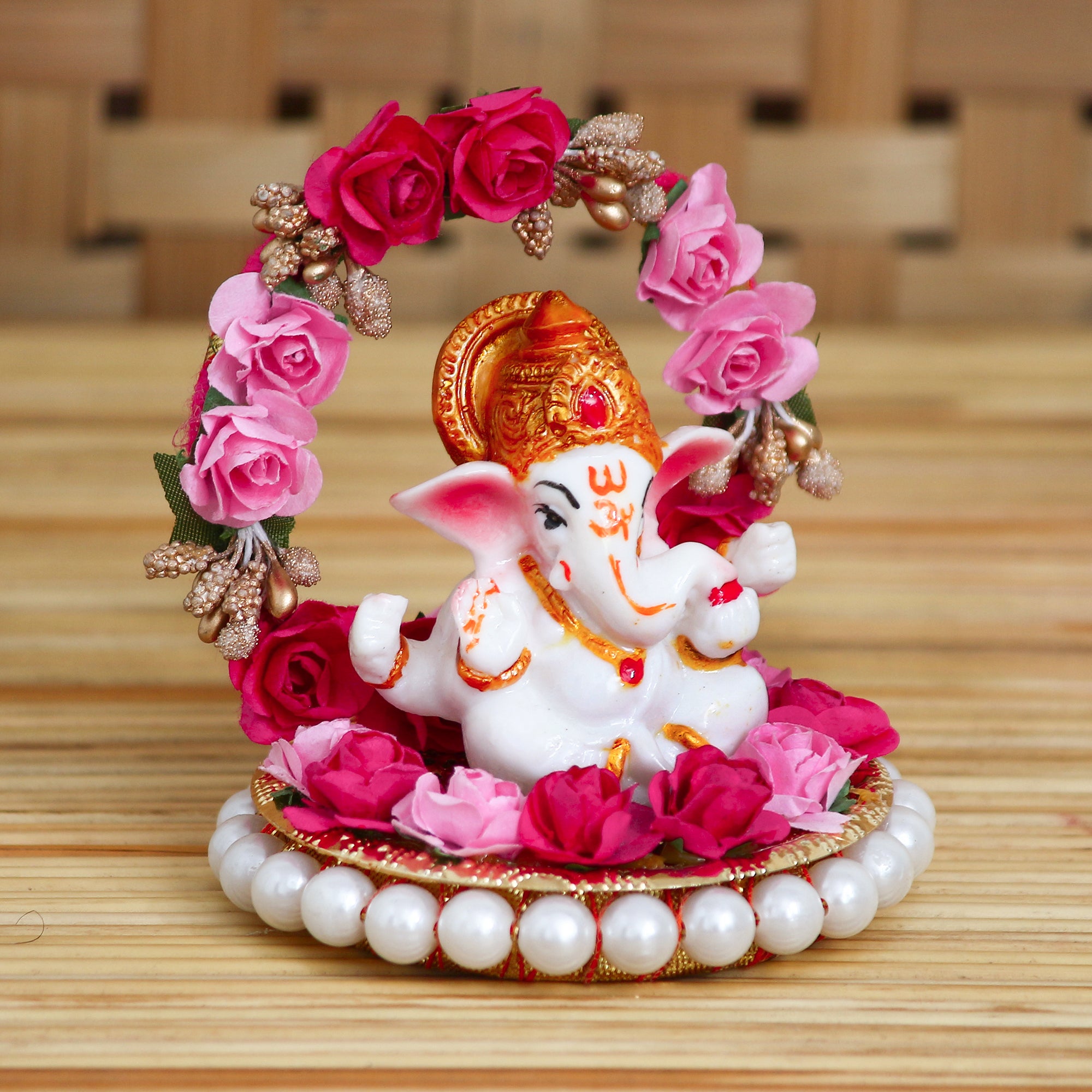 Polyresin Lord Ganesha Idol on Decorative Handcrafted Plate with Throne of Pink and Red Flowers 1
