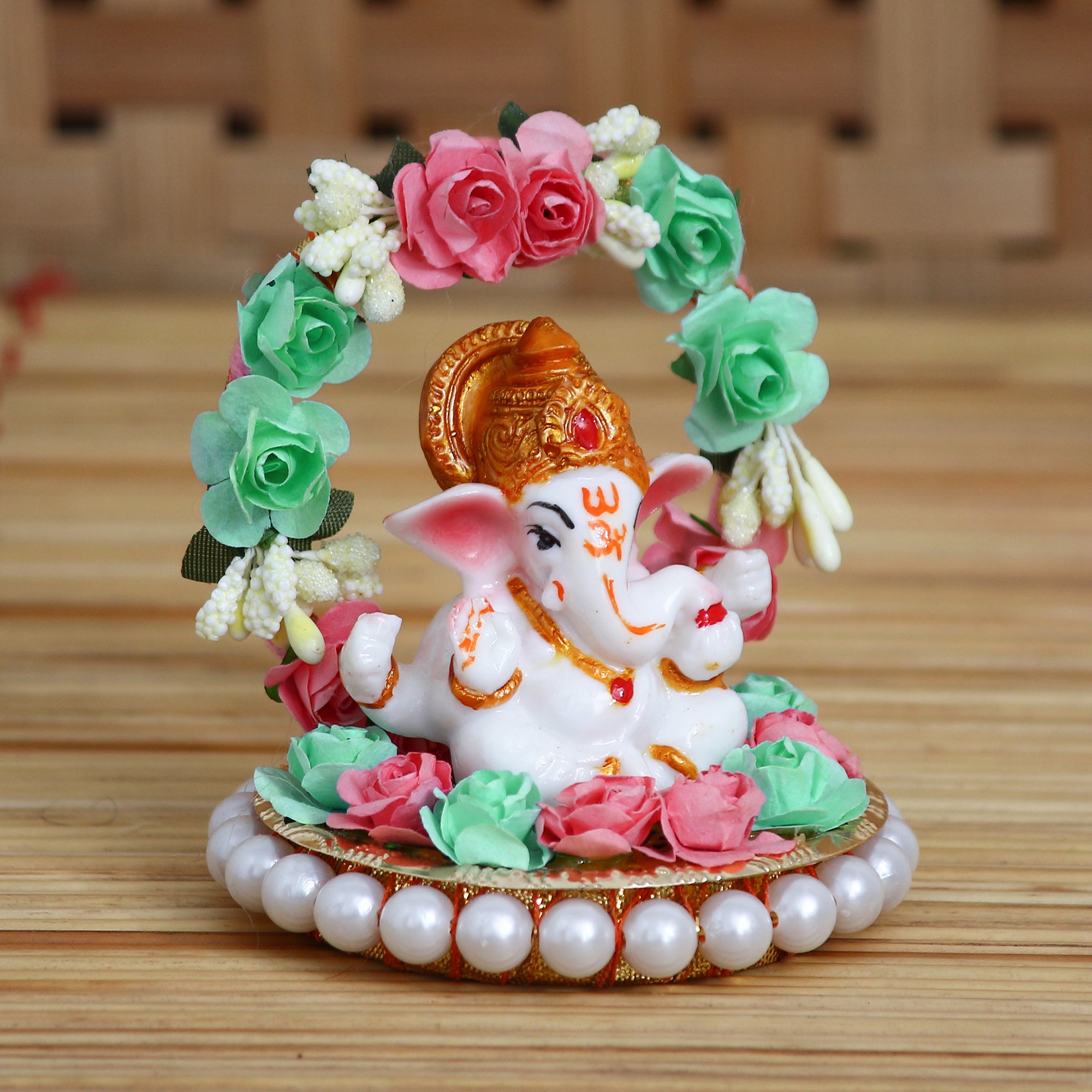 Lord Ganesha Idol On Decorative Handicrafted Plate With Throne Of Pink And Green Flowers 1