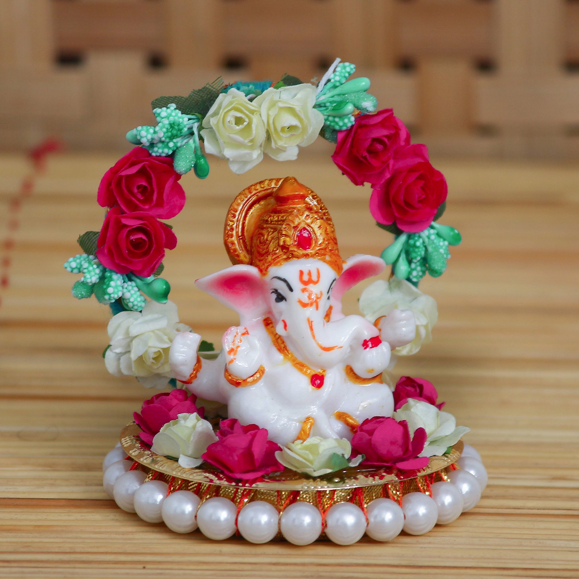 Polyresin Lord Ganesha Idol on Decorative Handcrafted Plate with Throne of Colorful Flowers 1