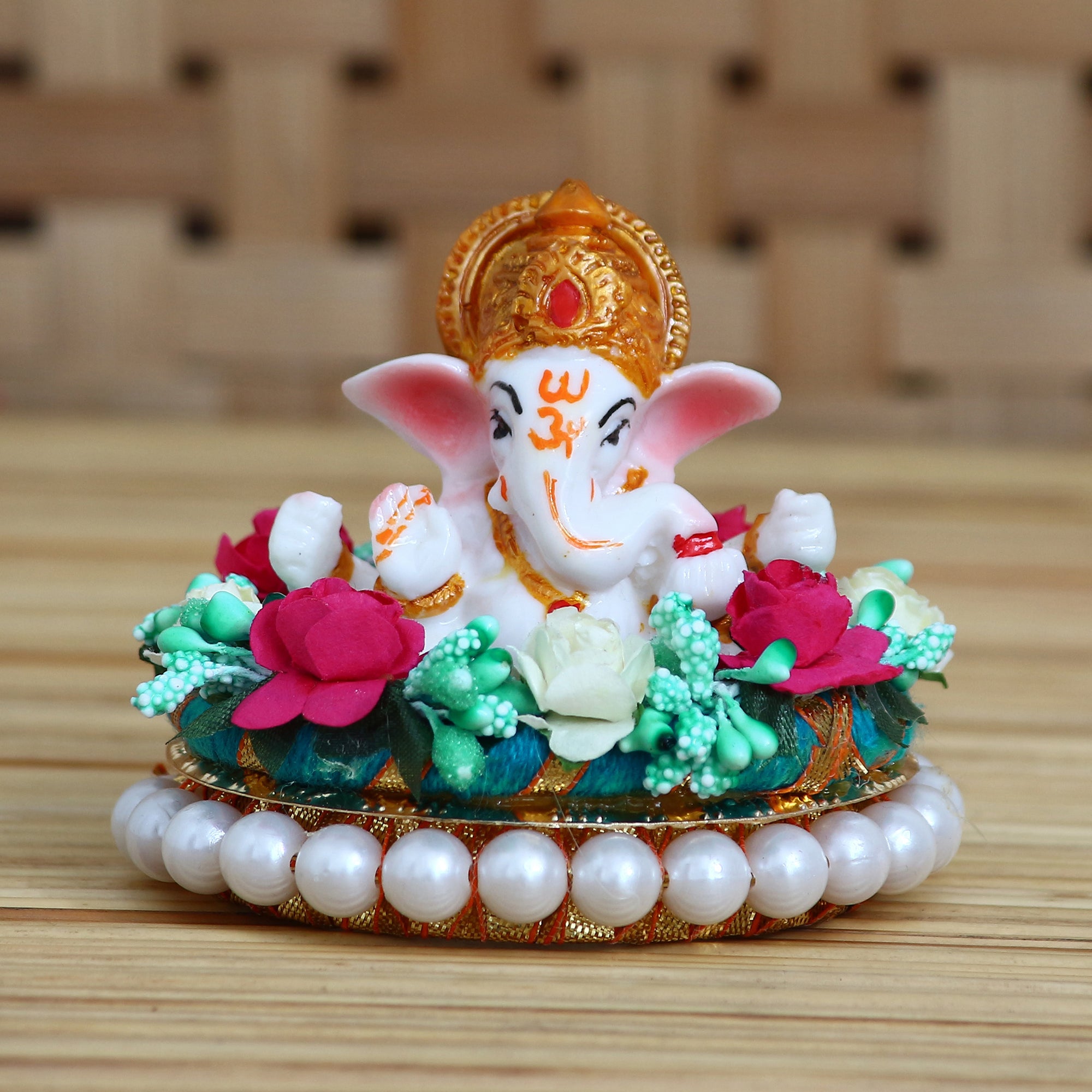 Lord Ganesha Idol on Decorative Handcrafted Plate with Colorful Flowers