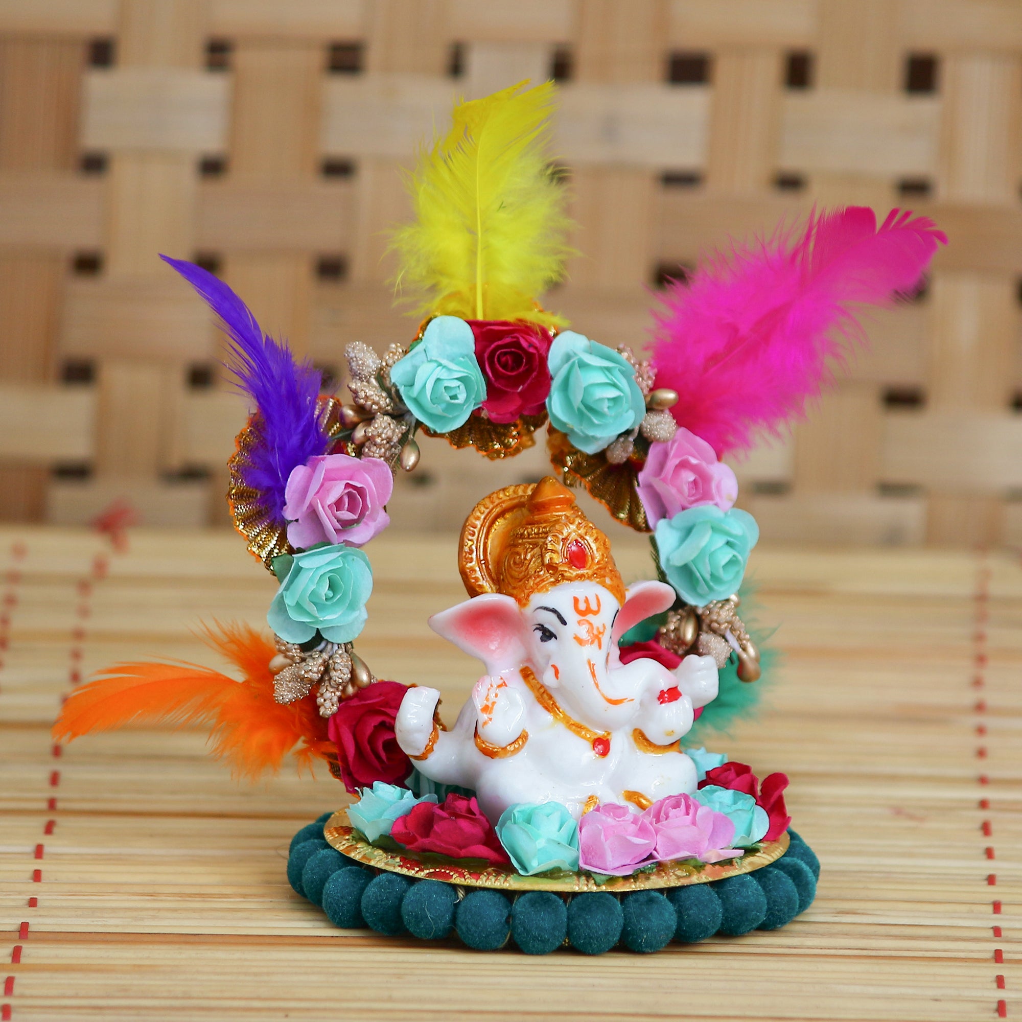 Lord Ganesha Idol On Decorative Handcrafted Plate With Throne Of Colorful Flowers And Feathers 1