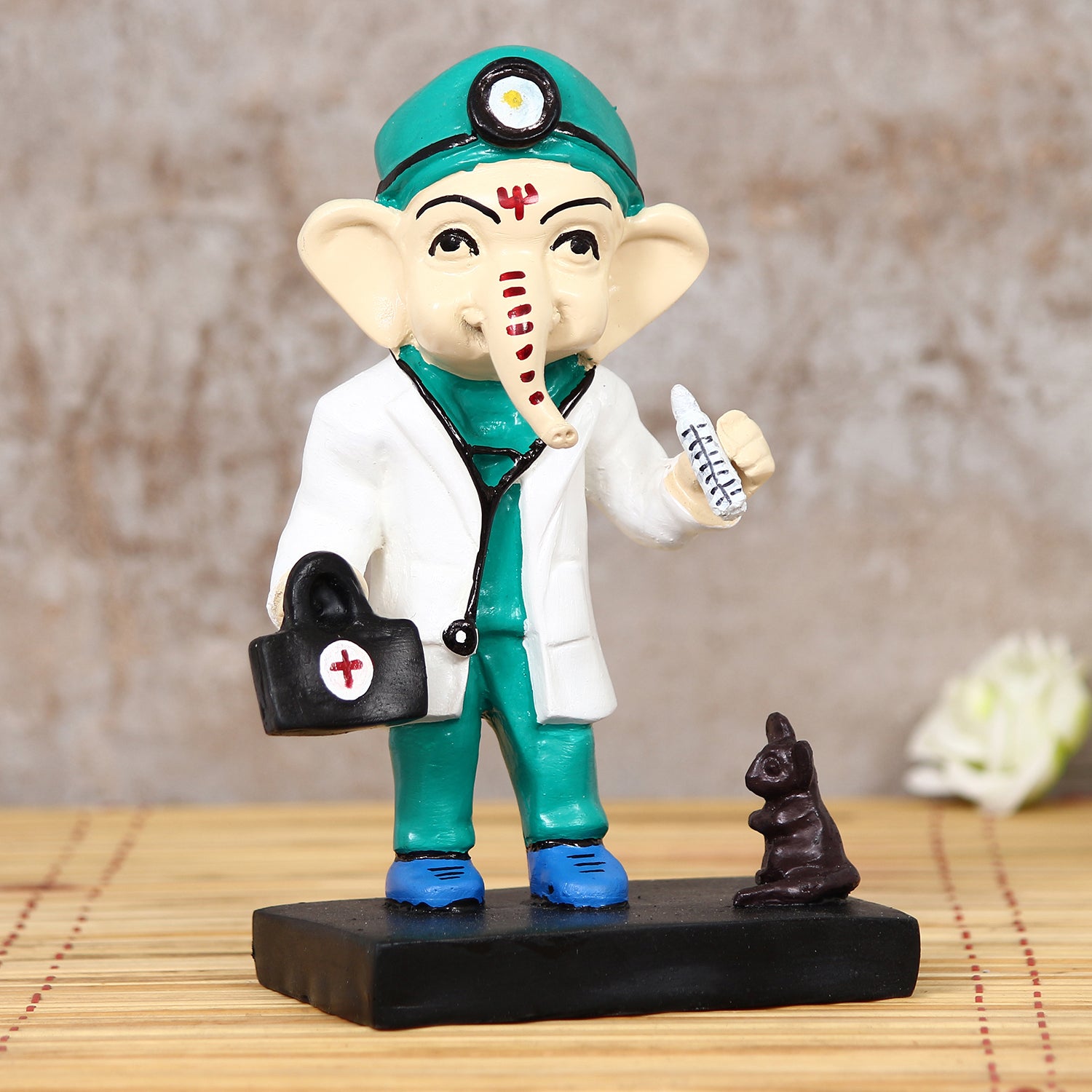 Polyresin Decorative Lord Ganesha Idol in Doctor Avatar (Green, White, Black and Blue)