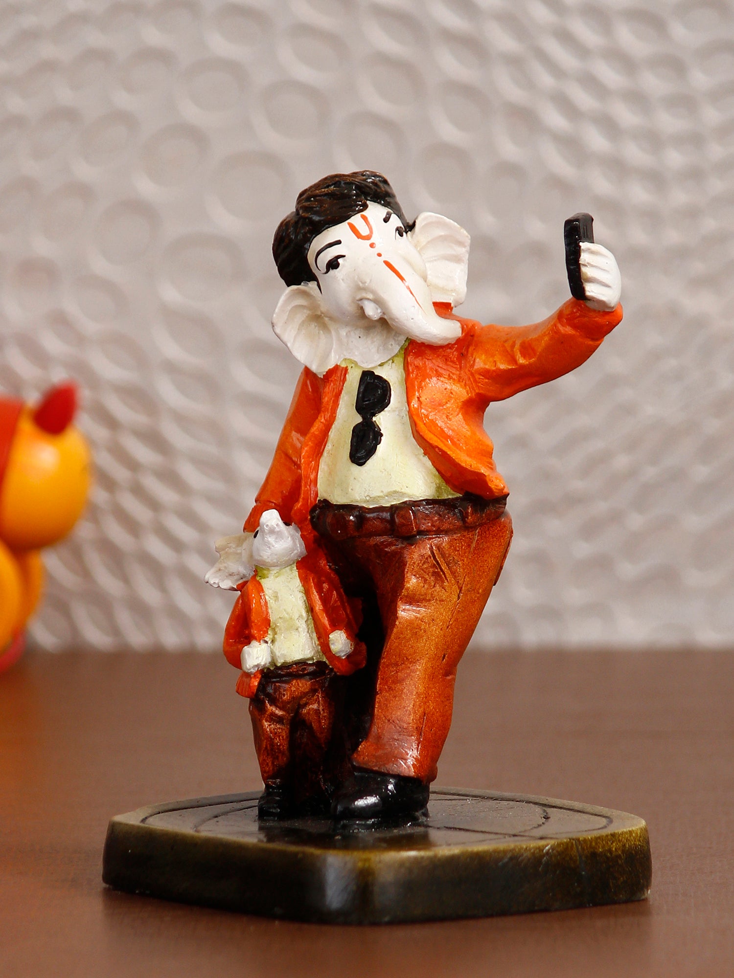 Orange and Brown Handcrafted Polyresin Lord Ganesha Idol Taking Selfie with Mushak 1