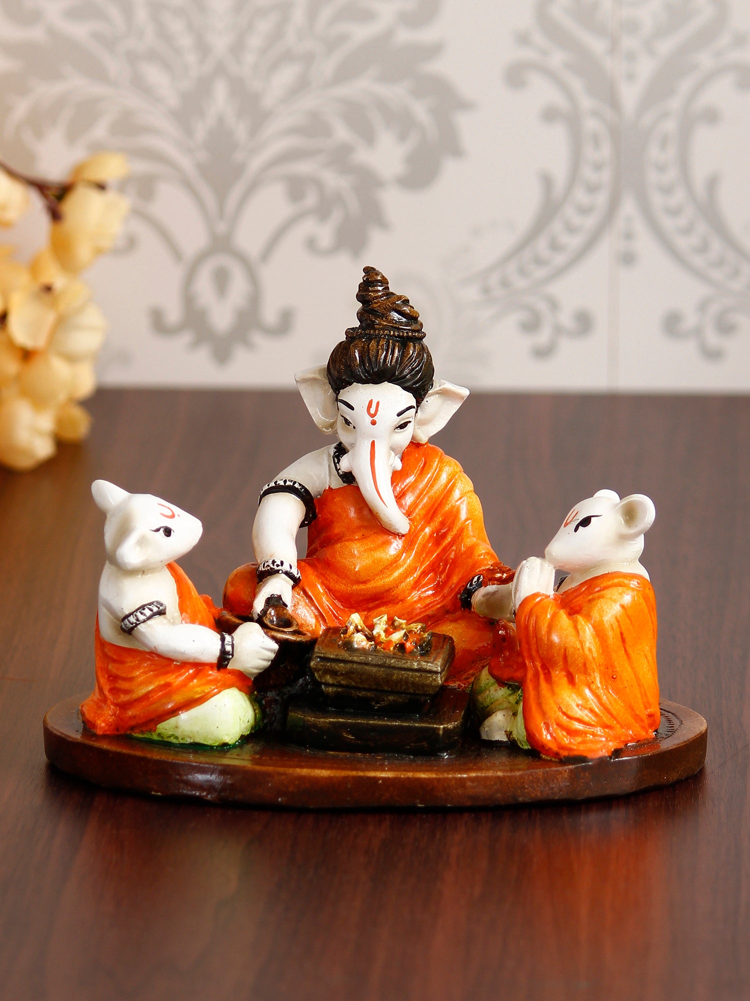 Orange and White Polyresin Handcrafted Lord Ganesha Idol Doing Havan with 2 Mushaks 1