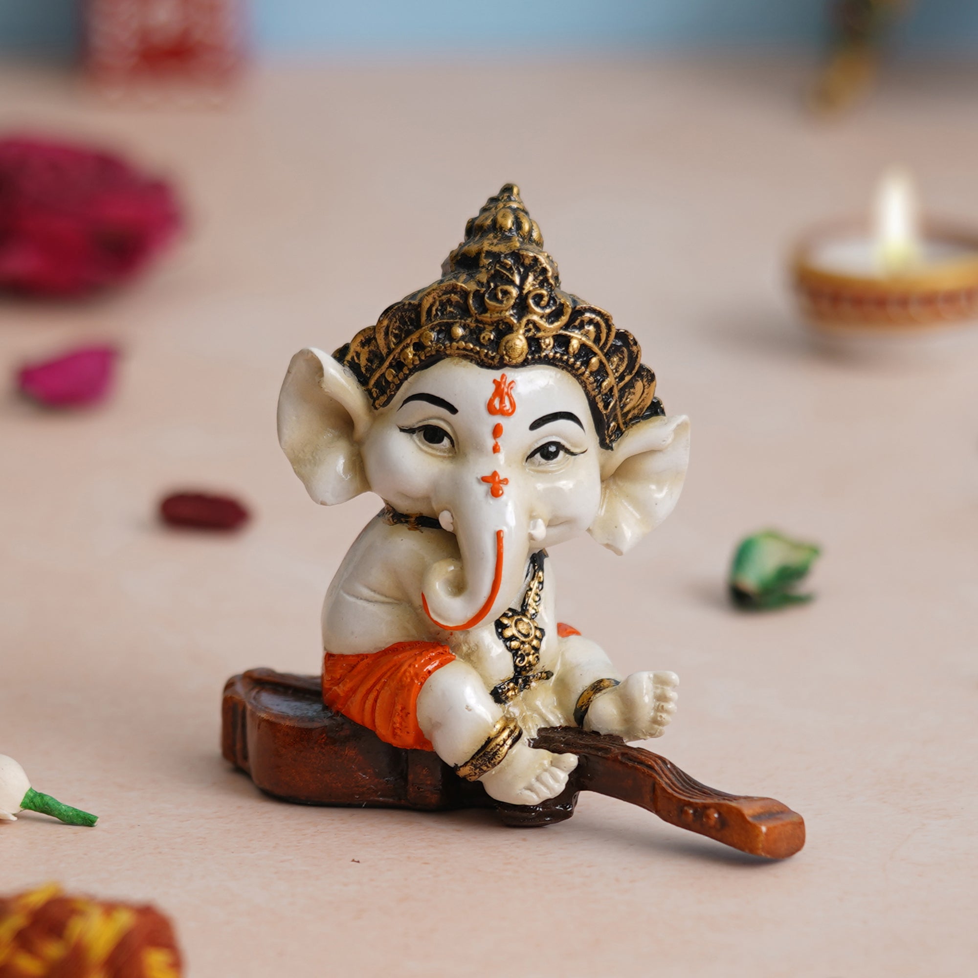 ecraftindia-orange-polyresin-decorated-lord-ganesha-idol-sitting-on-ve