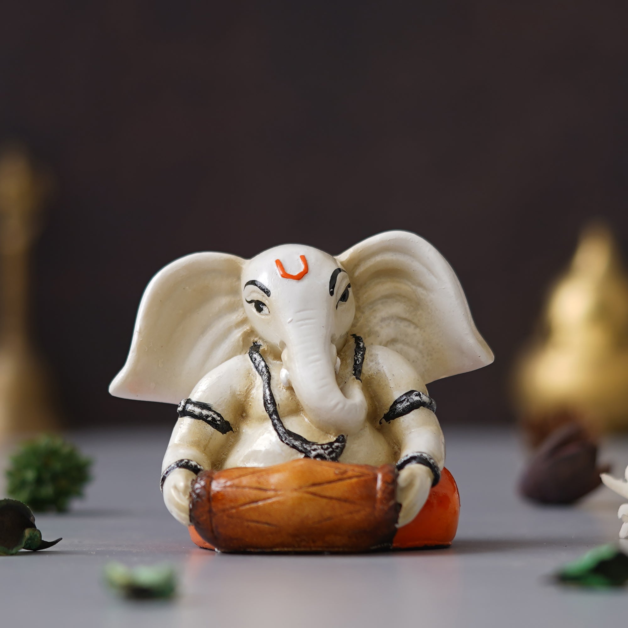 eCraftIndia White & Orange Polyresin Handcrafted Lord Ganesha Idol Playing Tabla Musical Instrument 4