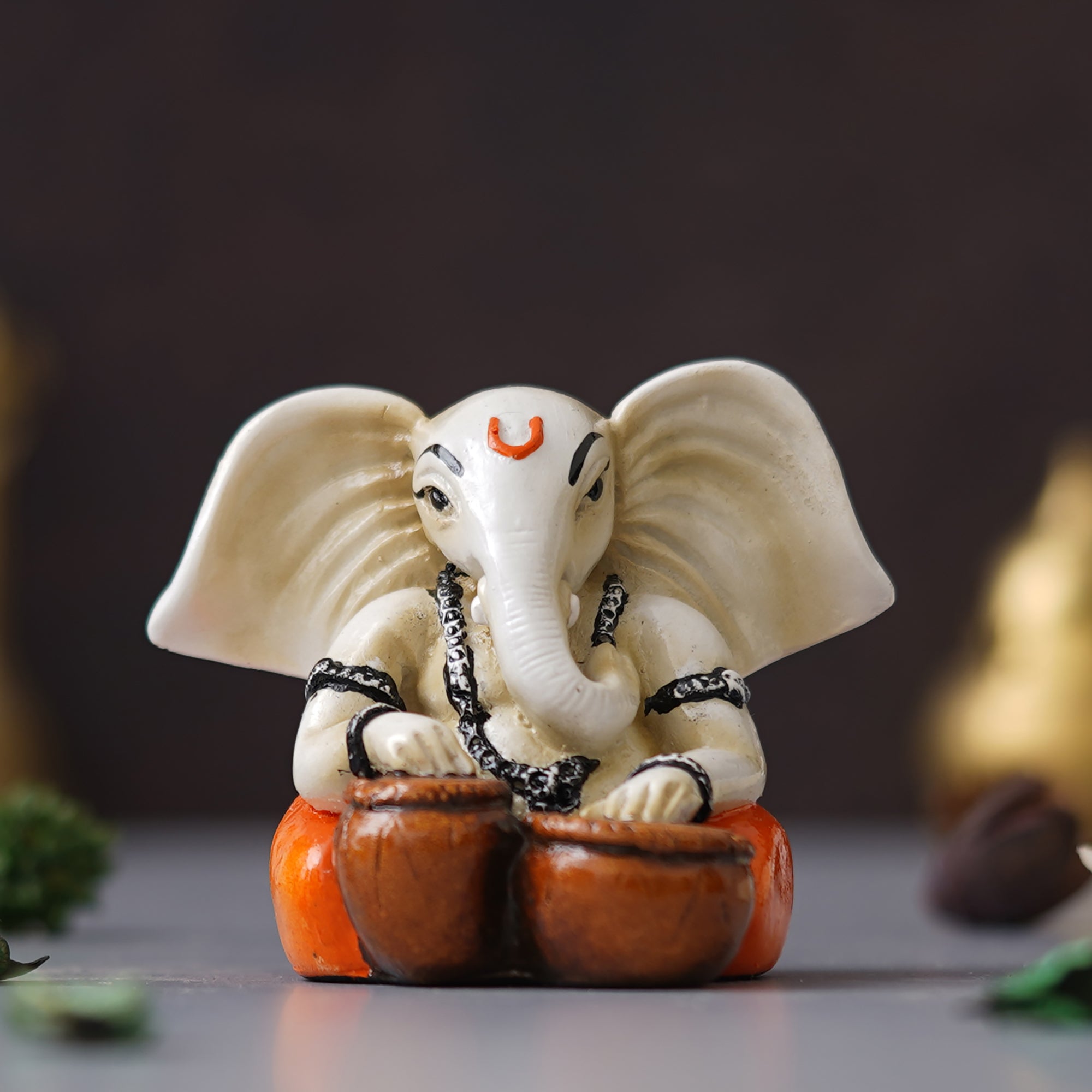 eCraftIndia White & Orange Polyresin Handcrafted Lord Ganesha Idol Playing Tabla Musical Instrument 4