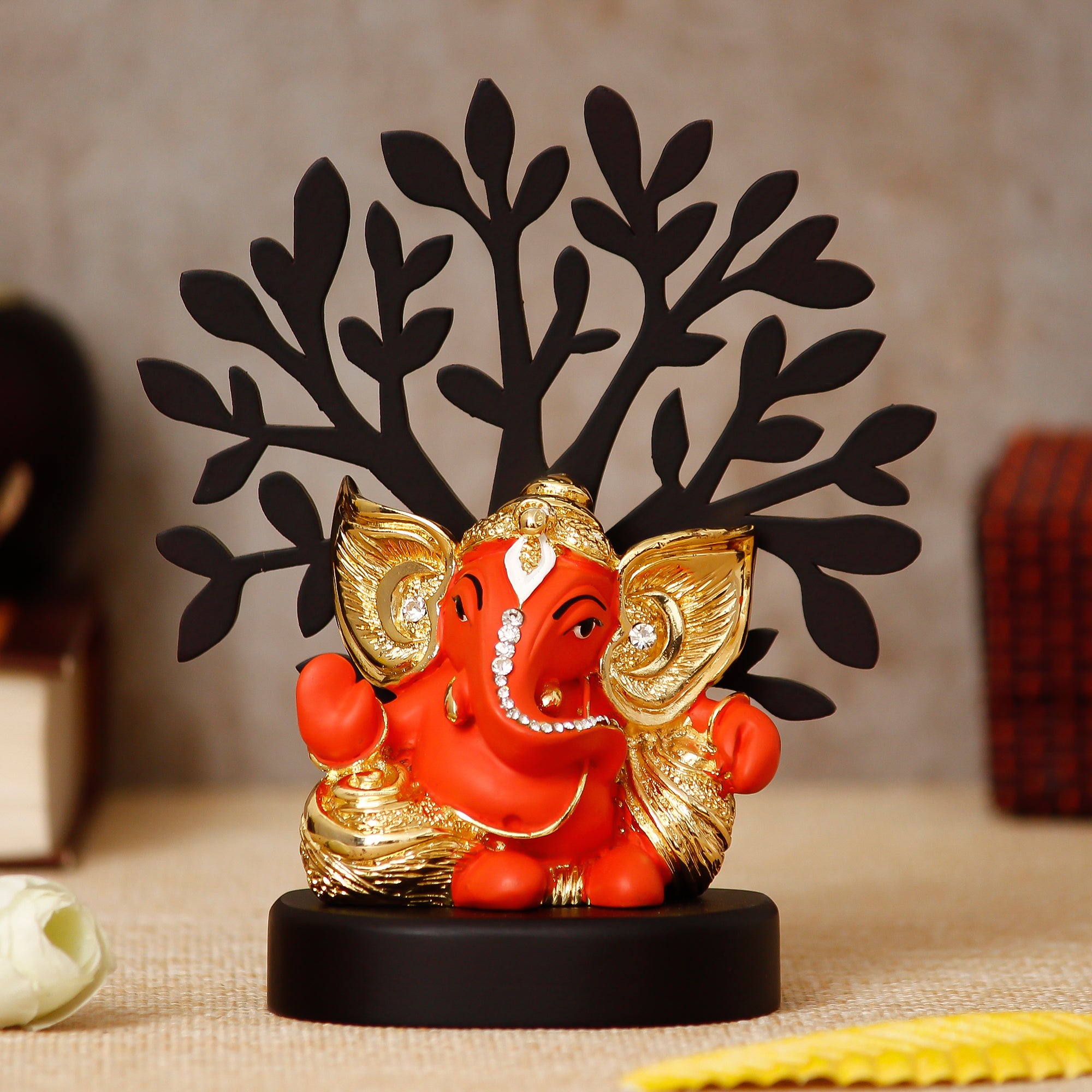 Gold Plated Orange Polyresin Ganesha Statue with Wooden Tree for Home, Temple, Office and Car Dashboard