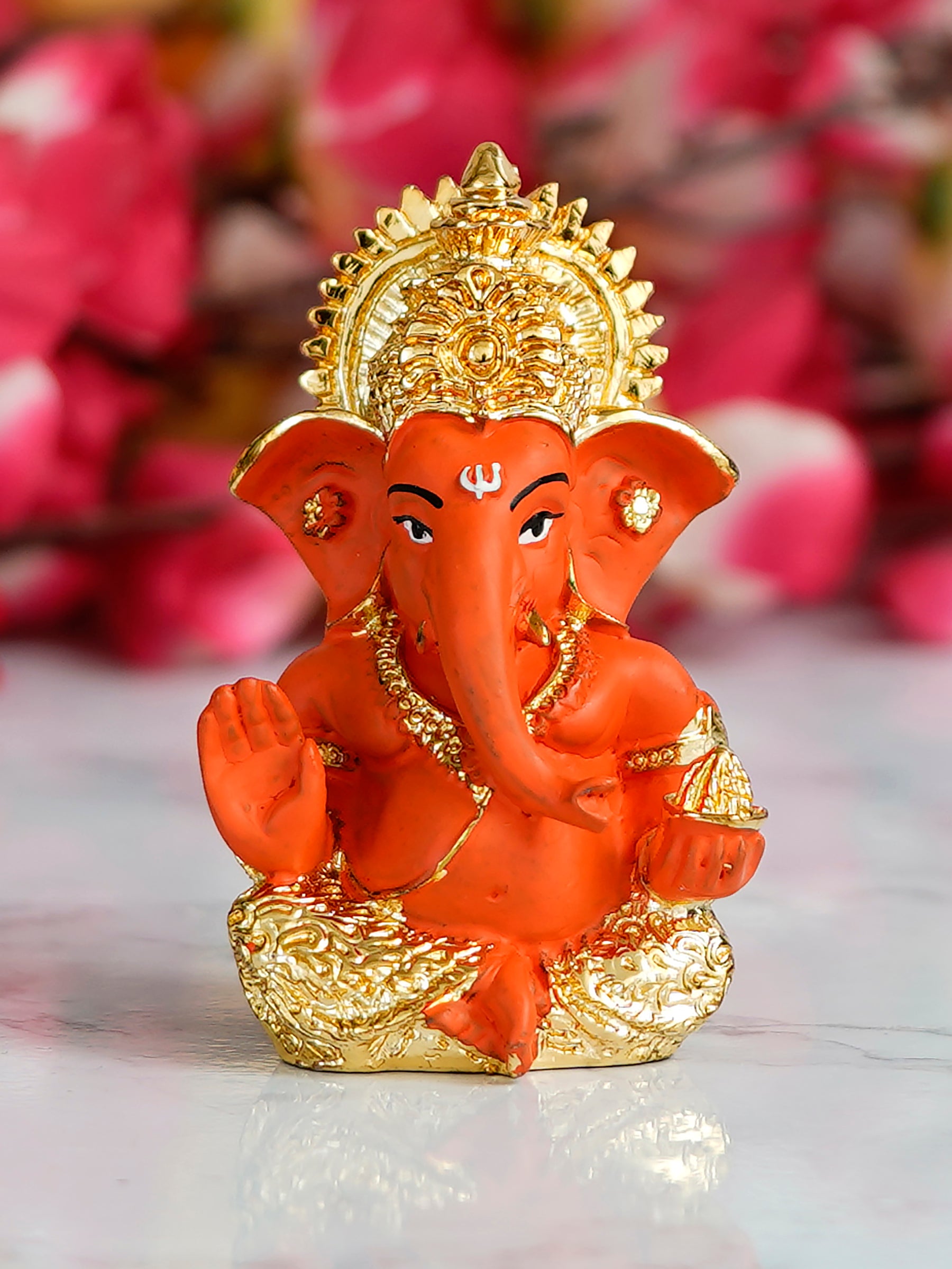 Gold Plated Orange Polyresin Ganesha Idol for Home, Temple, Office and Car Dashboard 1