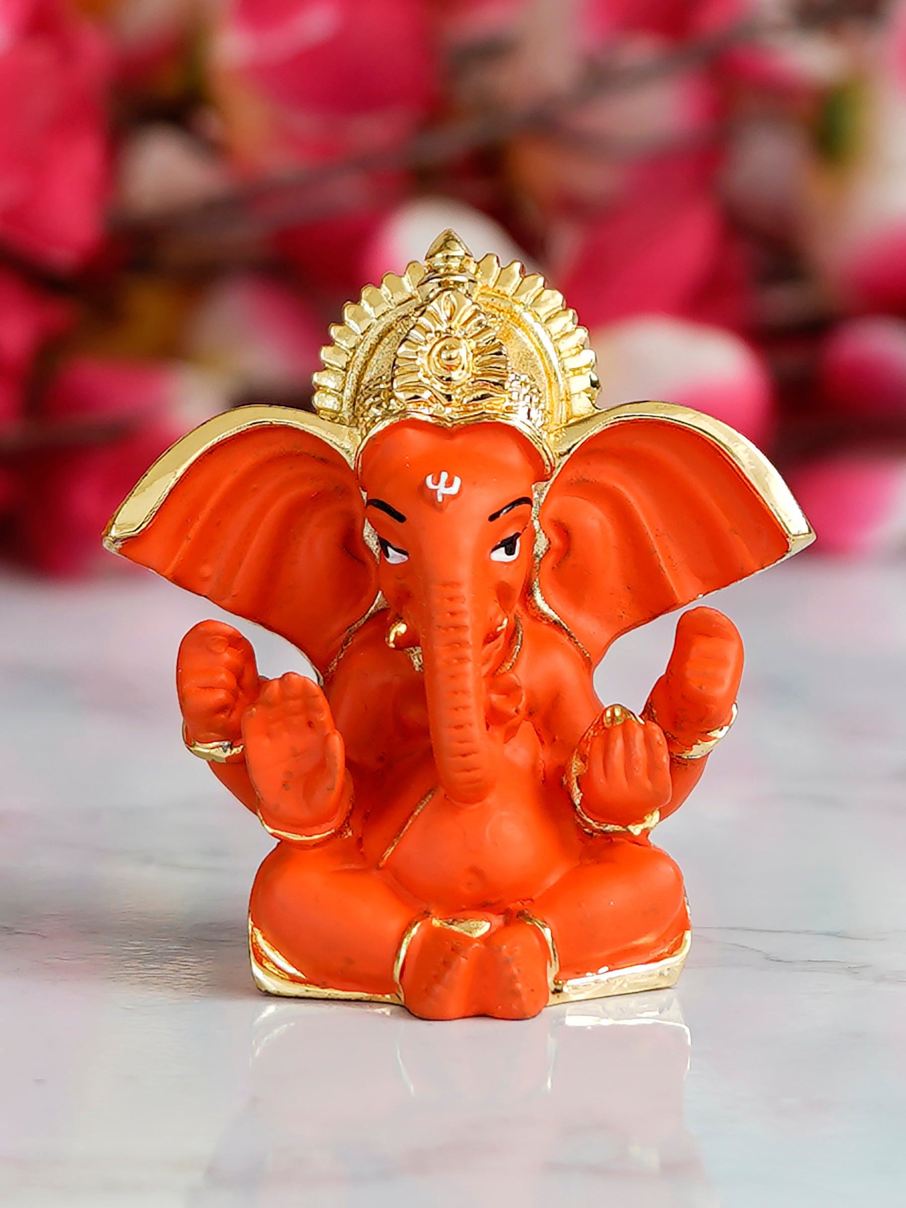 Gold Plated Orange Polyresin Ganesha Idol for Home, Temple, Office and Car Dashboard 1
