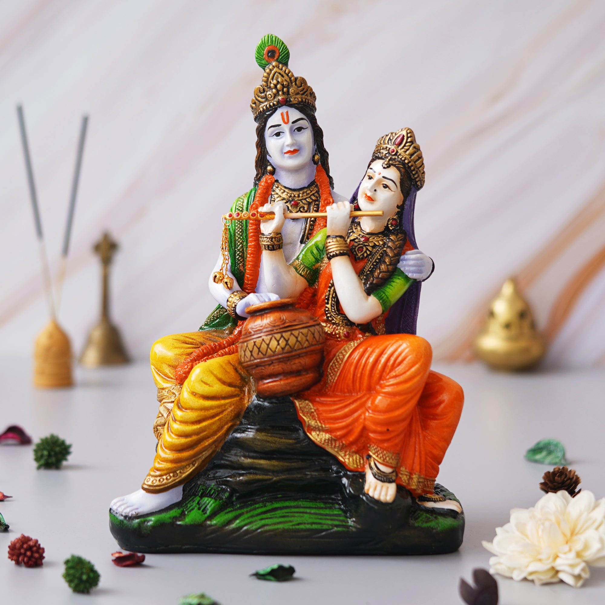 eCraftIndia Multicolor Polyresin Radha Krishna Idol Sitting on Rock Playing Flute and Holding Matki
