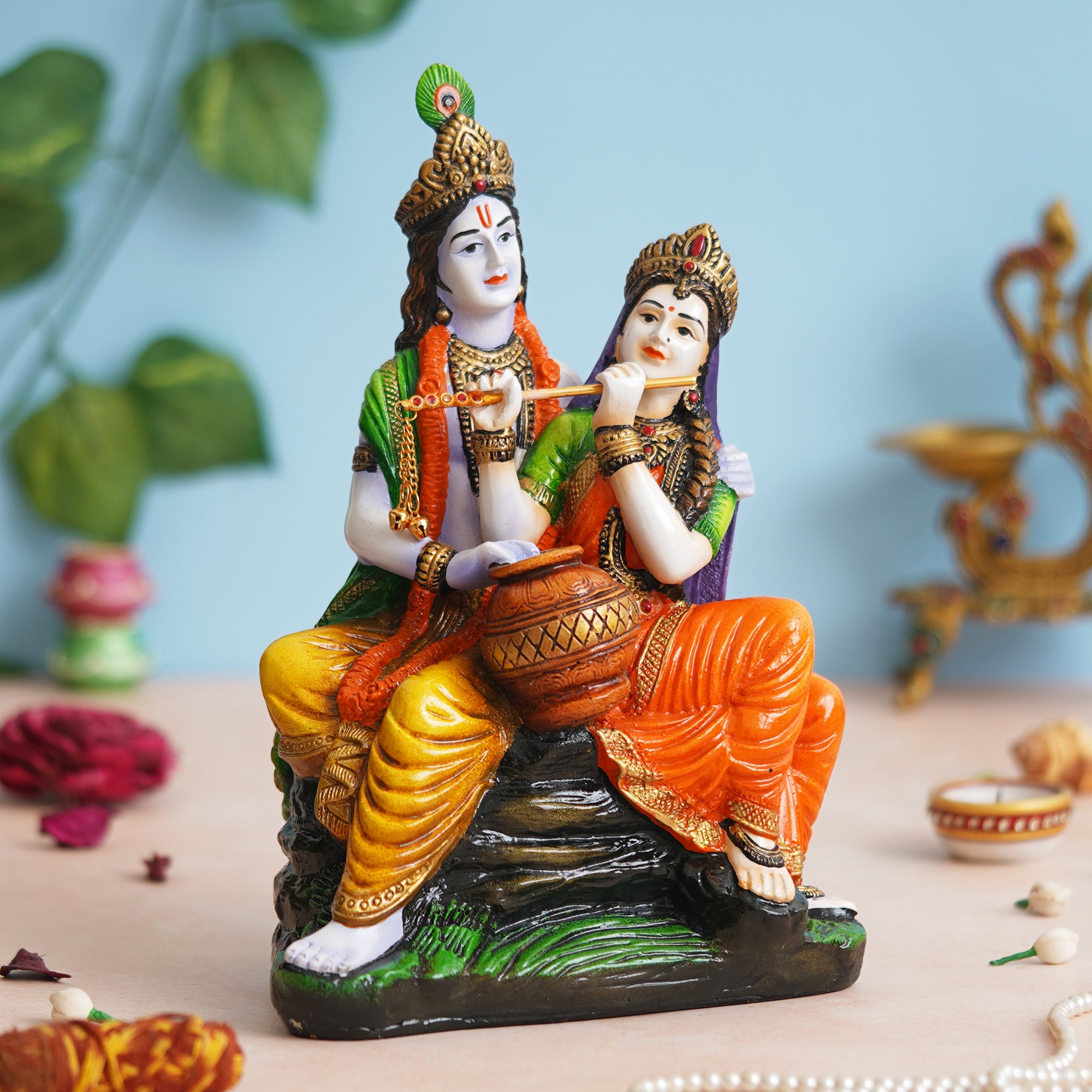 eCraftIndia Multicolor Polyresin Radha Krishna Idol Sitting on Rock Playing Flute and Holding Matki 4