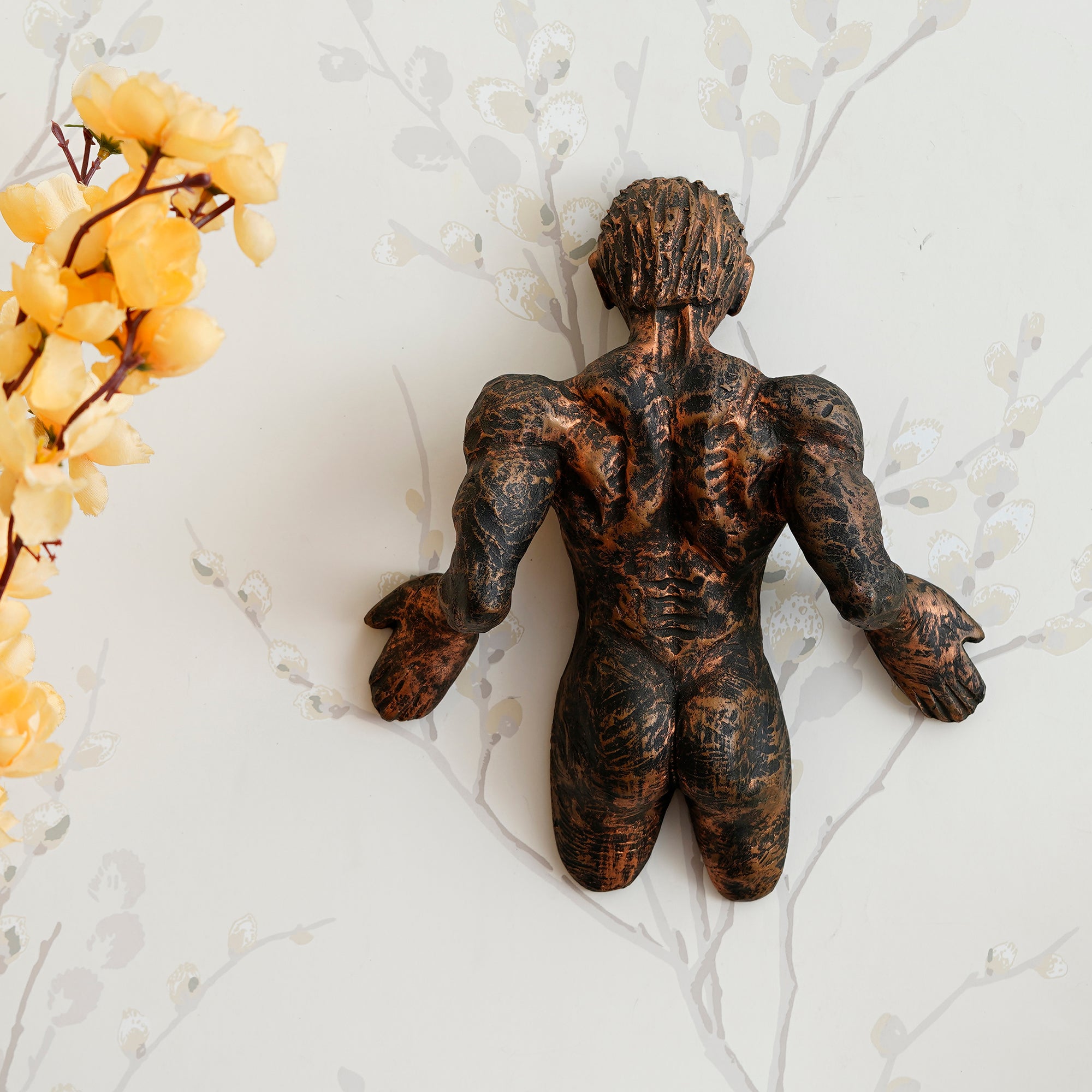 Brown Polyresin Man Pushing Wall Antique Finish Handcrafted Wall Decorative Showpiece 1
