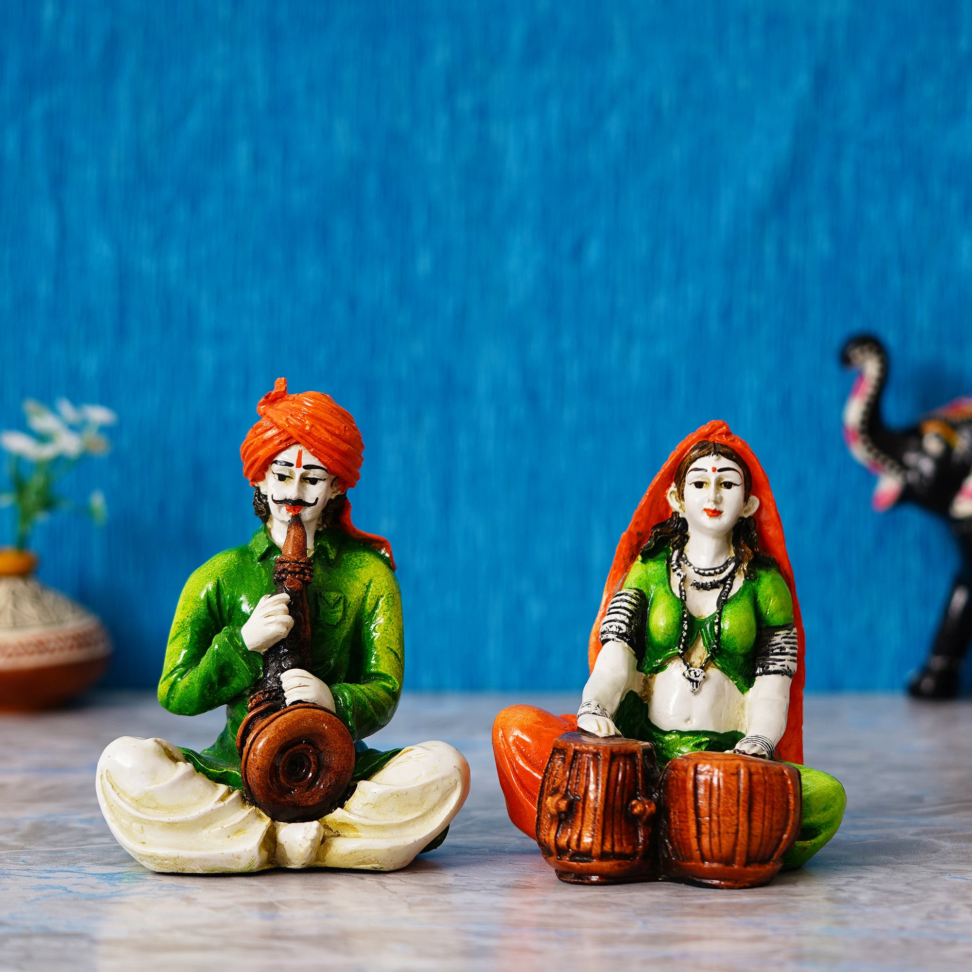 Colorful Combo of Rajasthani Craftsmen and Lady Playing a Musical Instrument Statue 1