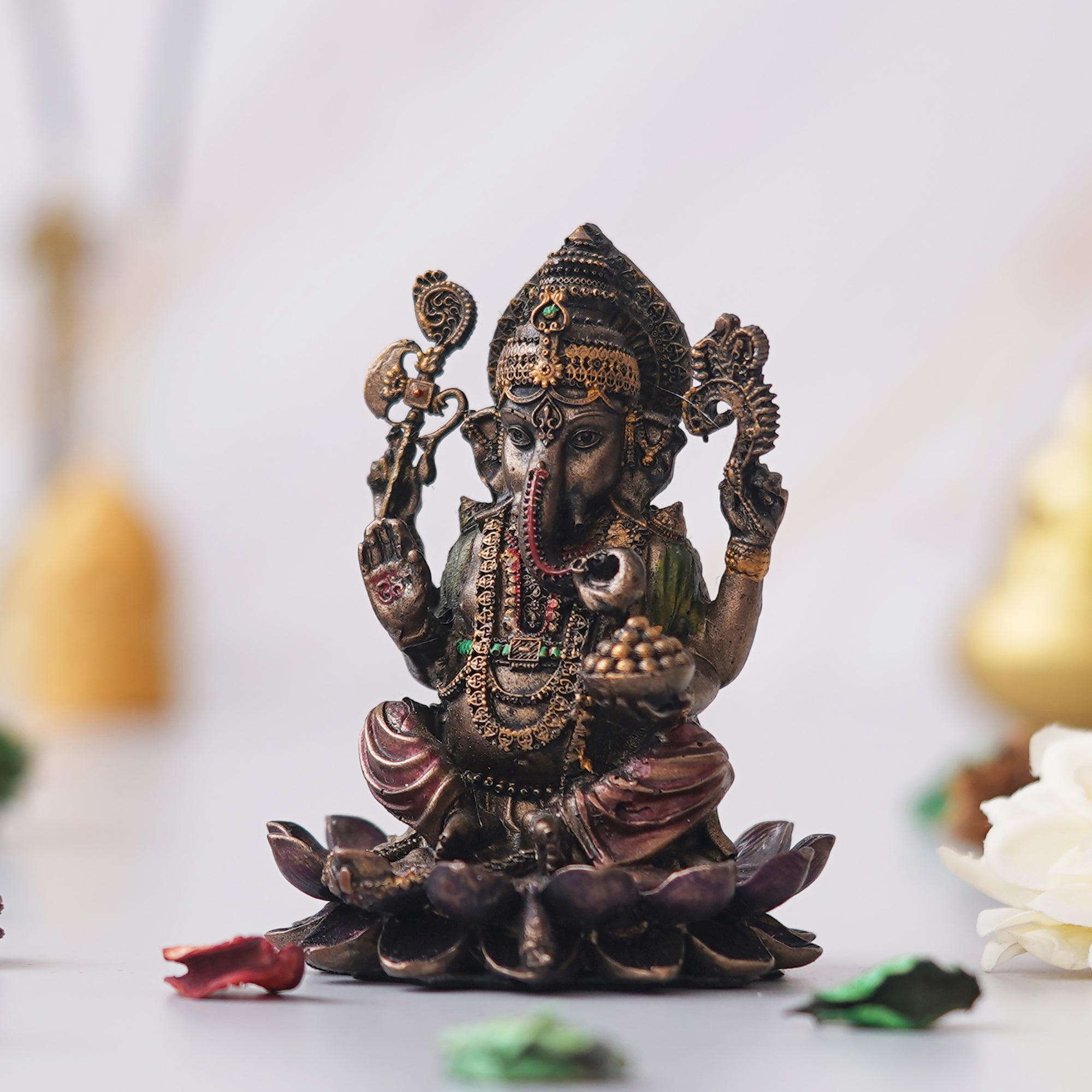 eCraftIndia Brown & Golden Polyresin Handcrafted Lord Ganesha Statue Sitting On Lotus