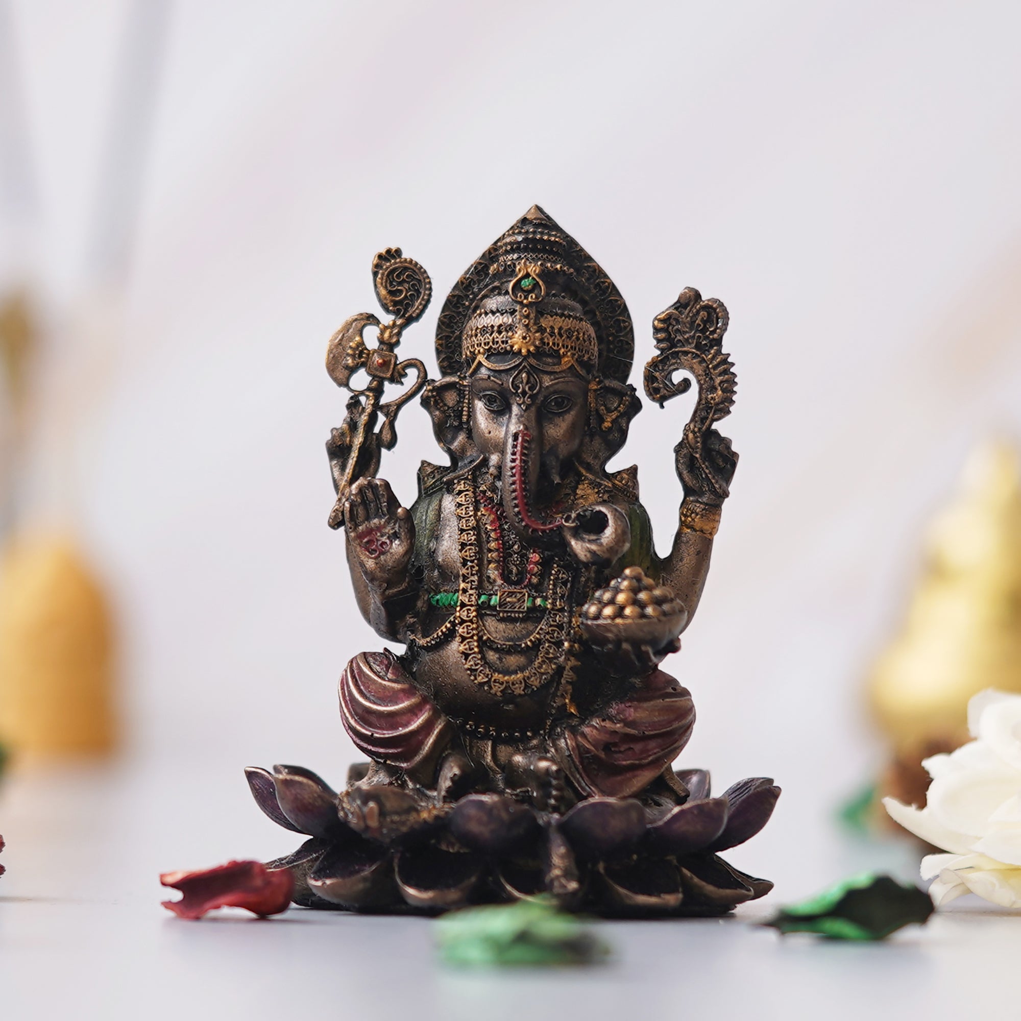 eCraftIndia Brown & Golden Polyresin Handcrafted Lord Ganesha Statue Sitting On Lotus 1