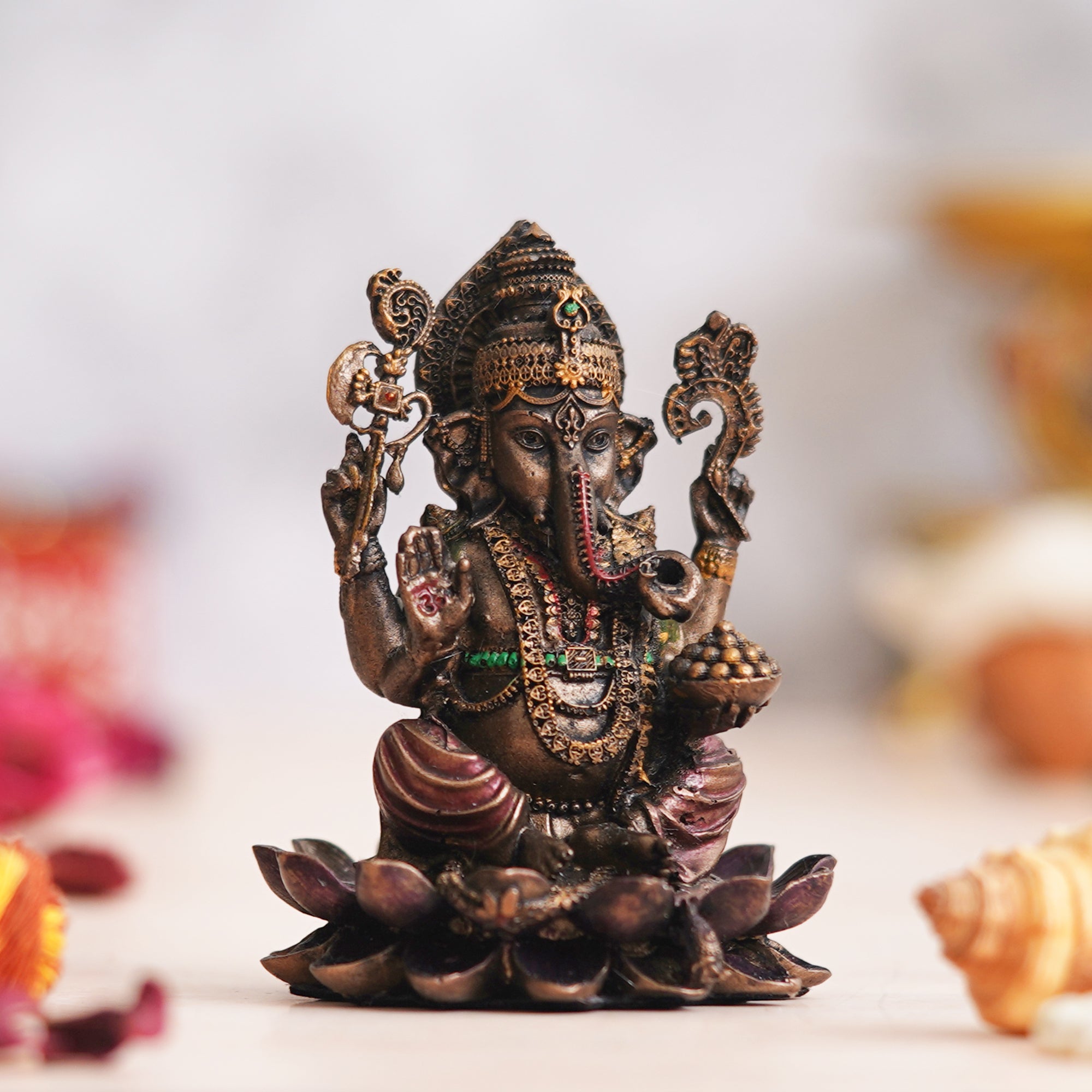 eCraftIndia Brown & Golden Polyresin Handcrafted Lord Ganesha Statue Sitting On Lotus 5
