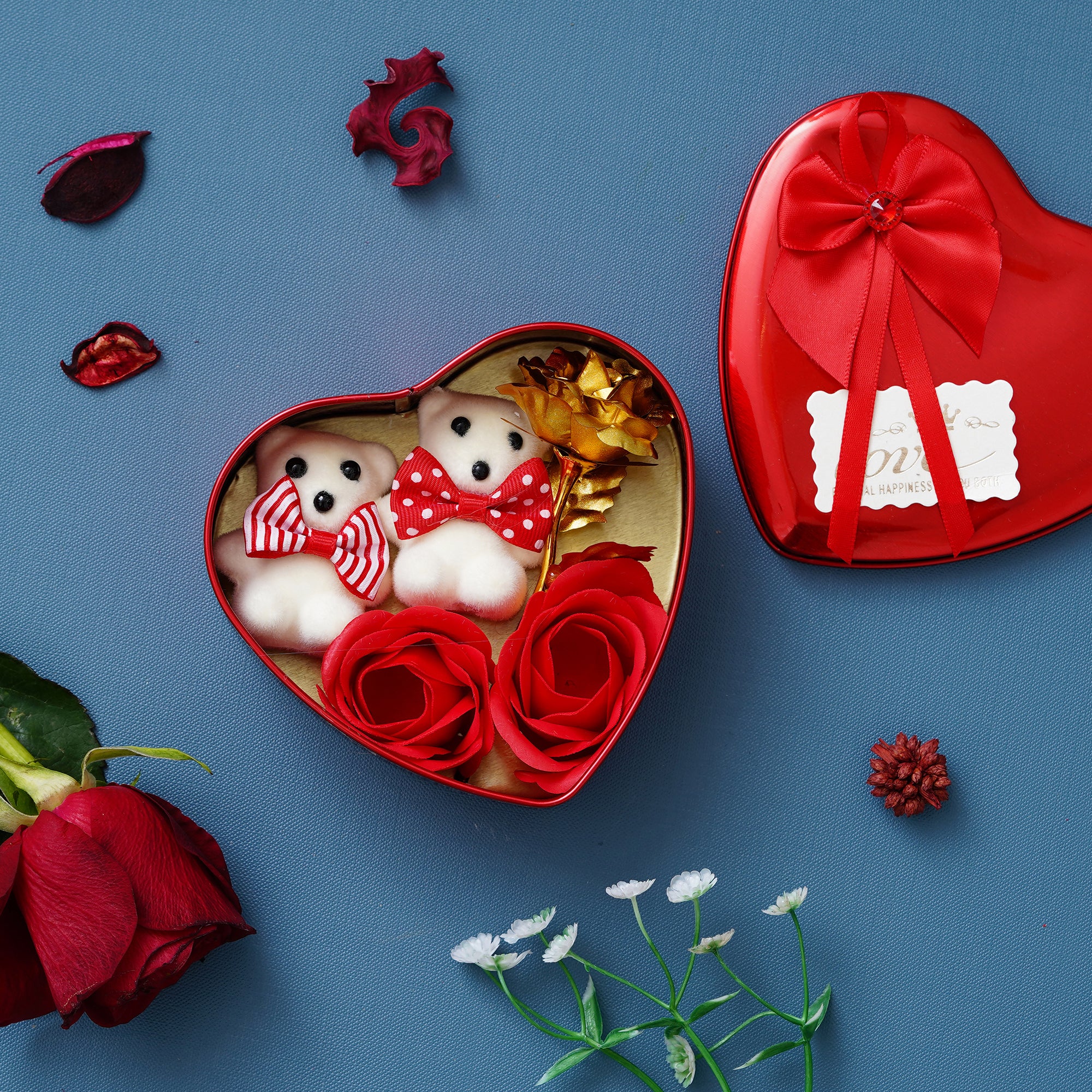 Red Heart Shaped Gift Box with 1 Golden Rose, 3 Red Roses, 1 Teddy Bear and a Card