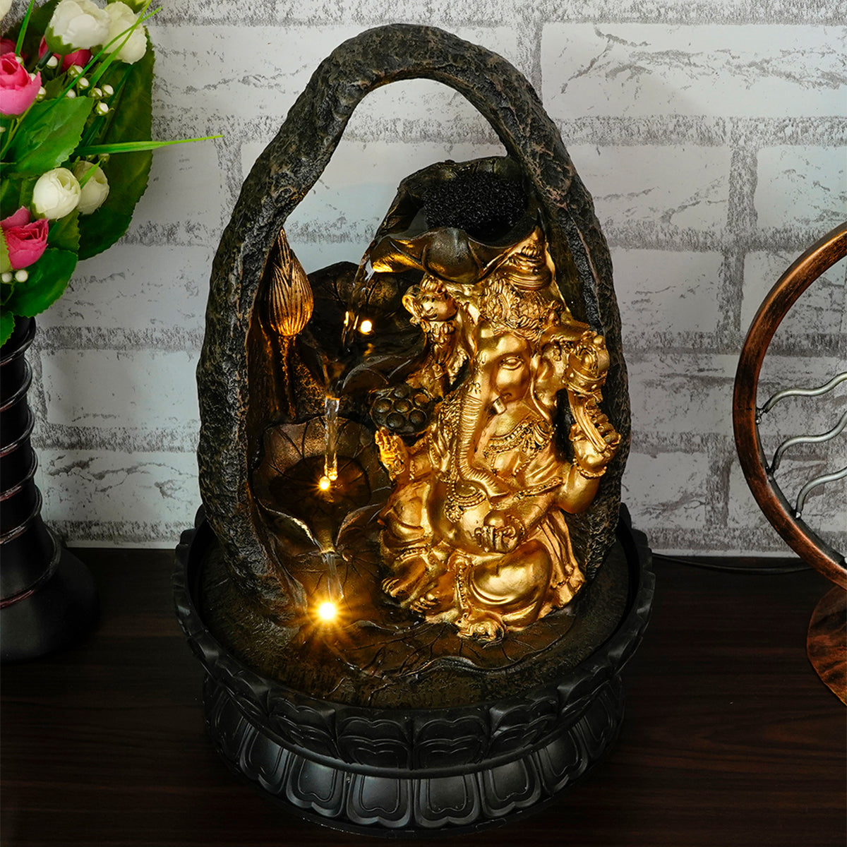 Polystone Black and Golden Decorative Lord Ganesha Idol Water Fountain With Light For Home/Office Décor