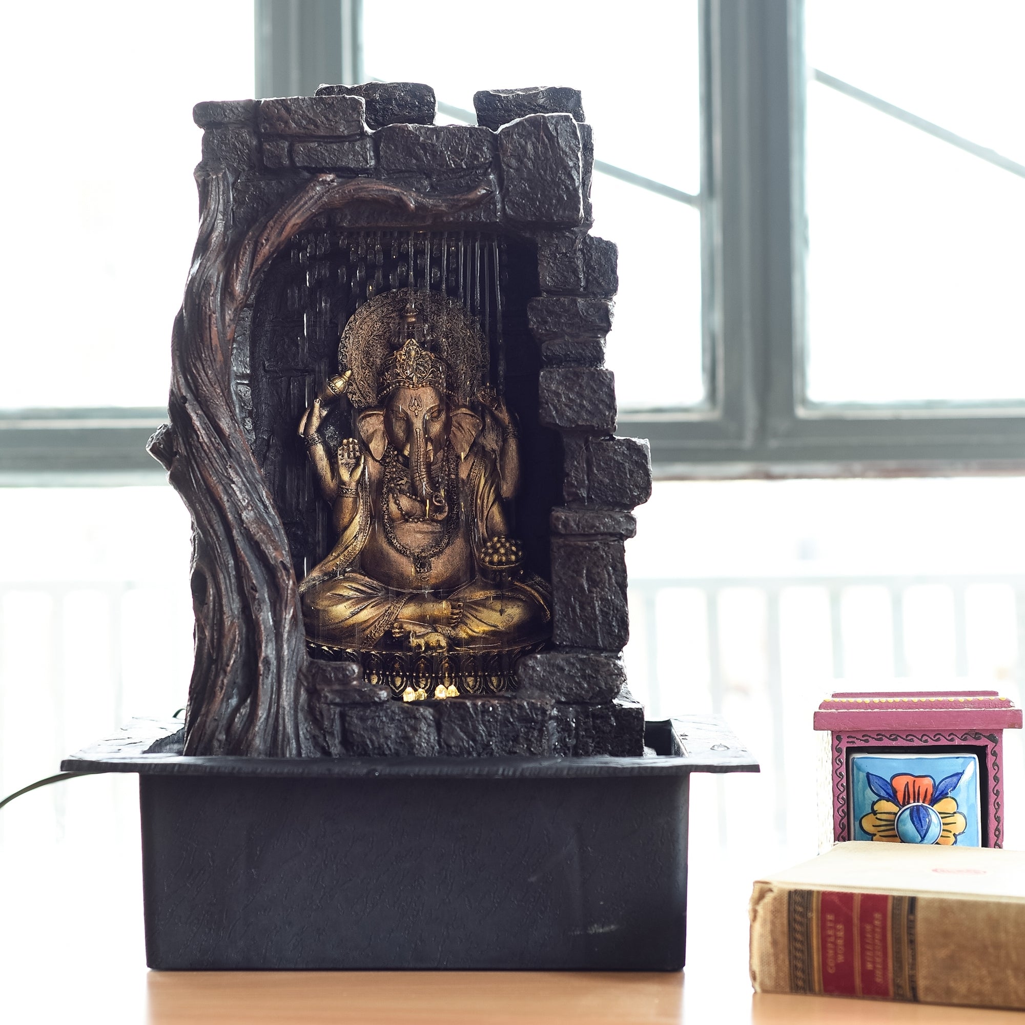 Polystone Brown and Golden Textured Lord Ganesha Idol Water Fountain
